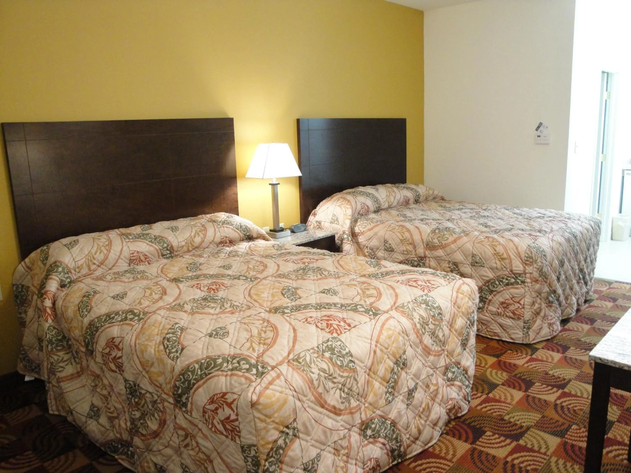 Bed in Sands Inn & Suites