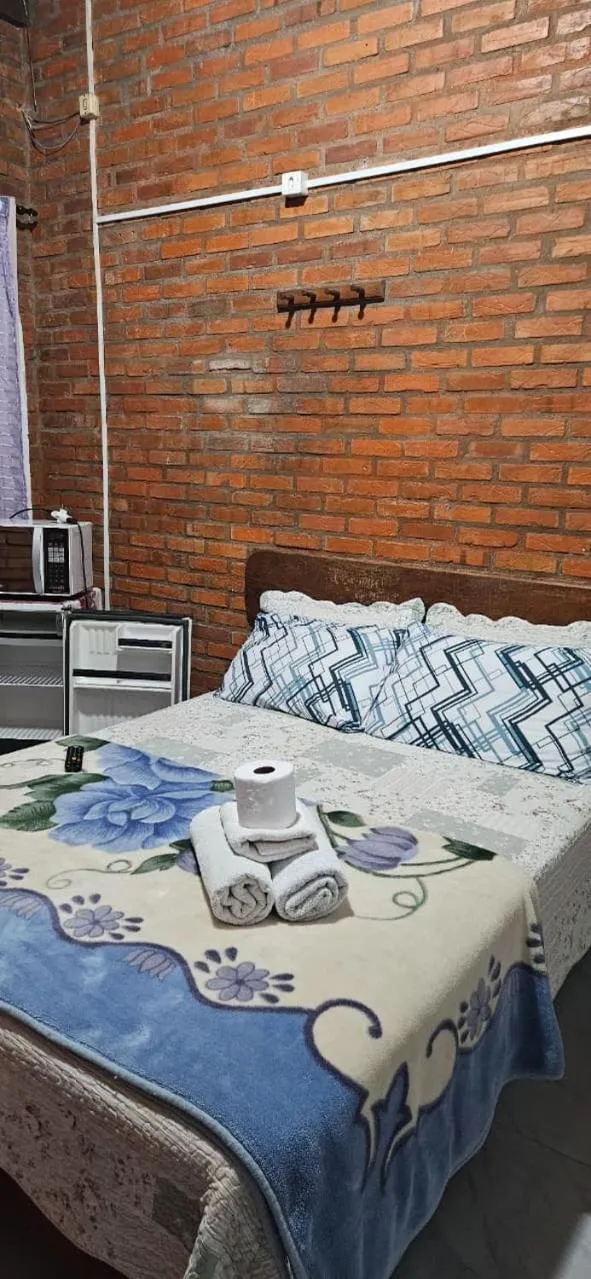 Bed in Pousada Marujo