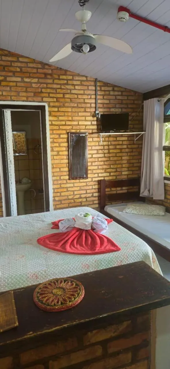 Bed in Pousada Marujo