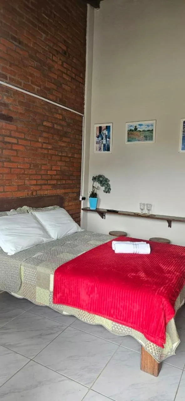 Bed in Pousada Marujo