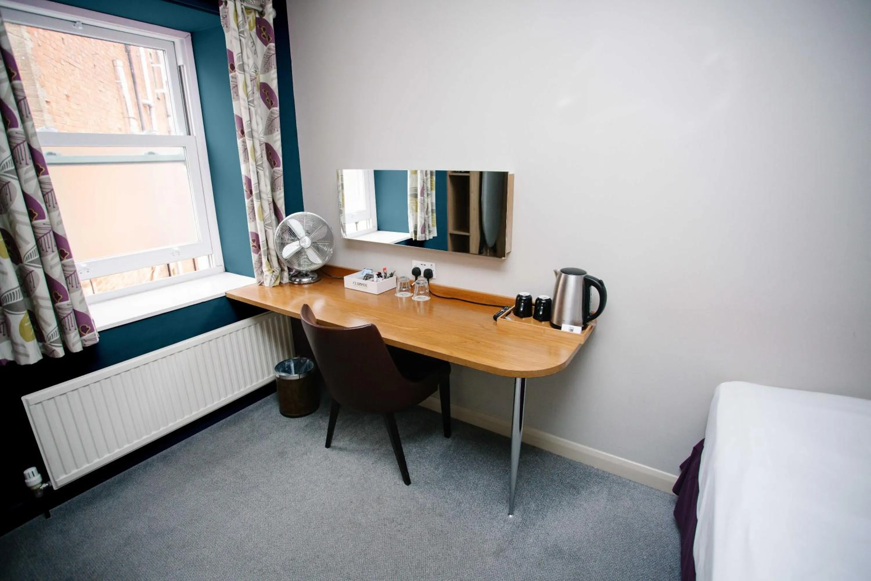 Bedroom in The Corner House Hotel