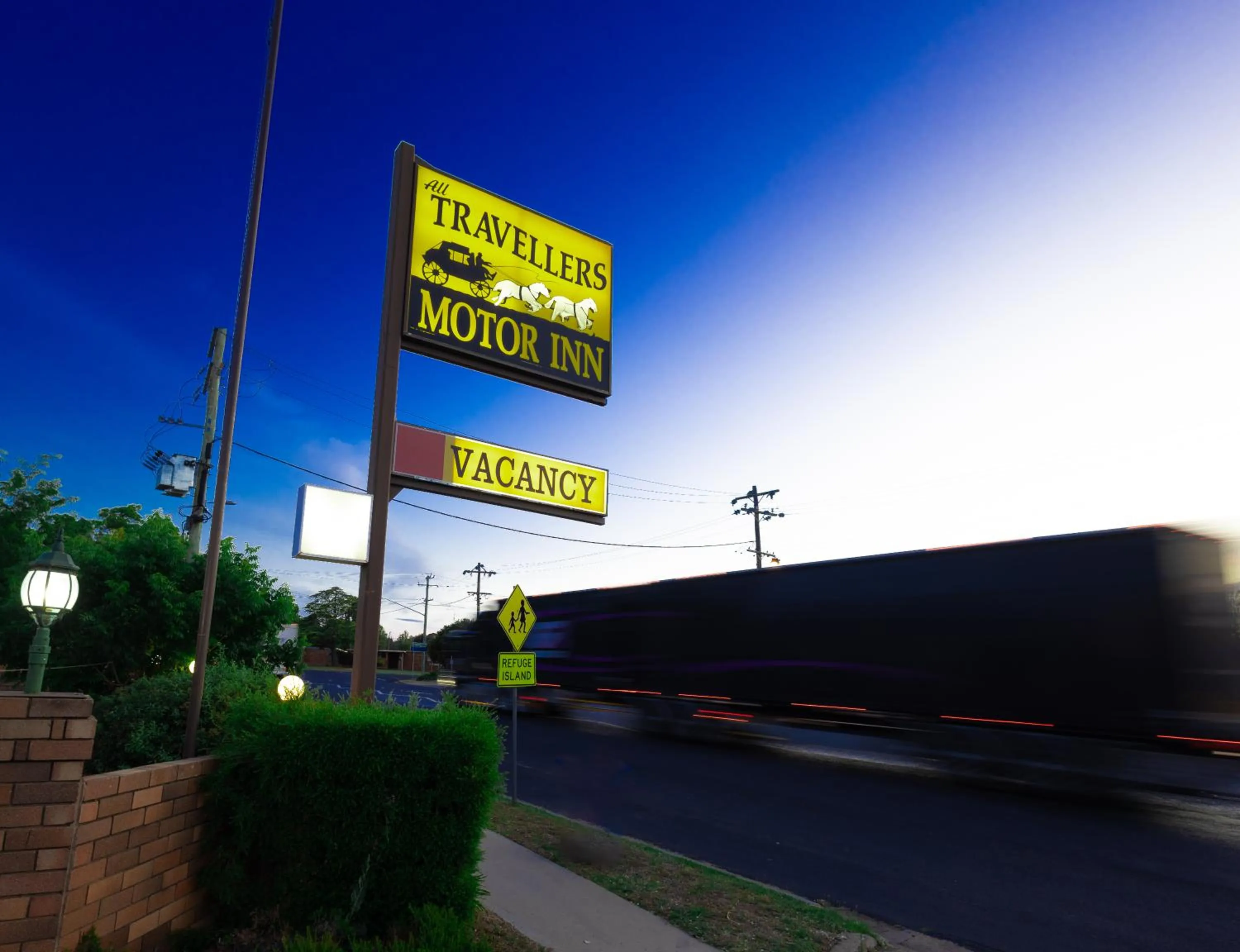 Property logo or sign in All Travellers Motor Inn