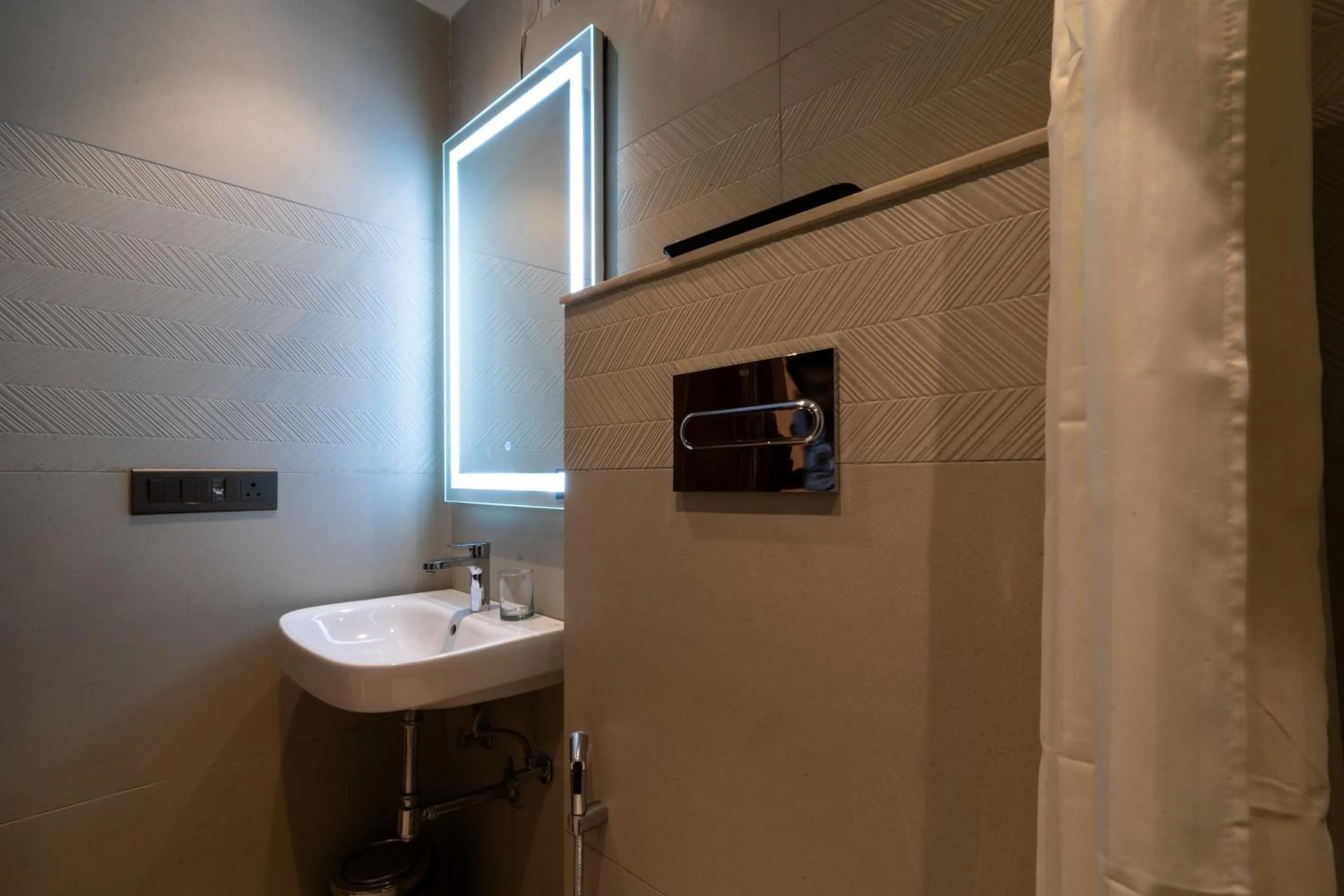 Bathroom in Hotel Bluestone Prime Nehru Place by The Cosy hotels