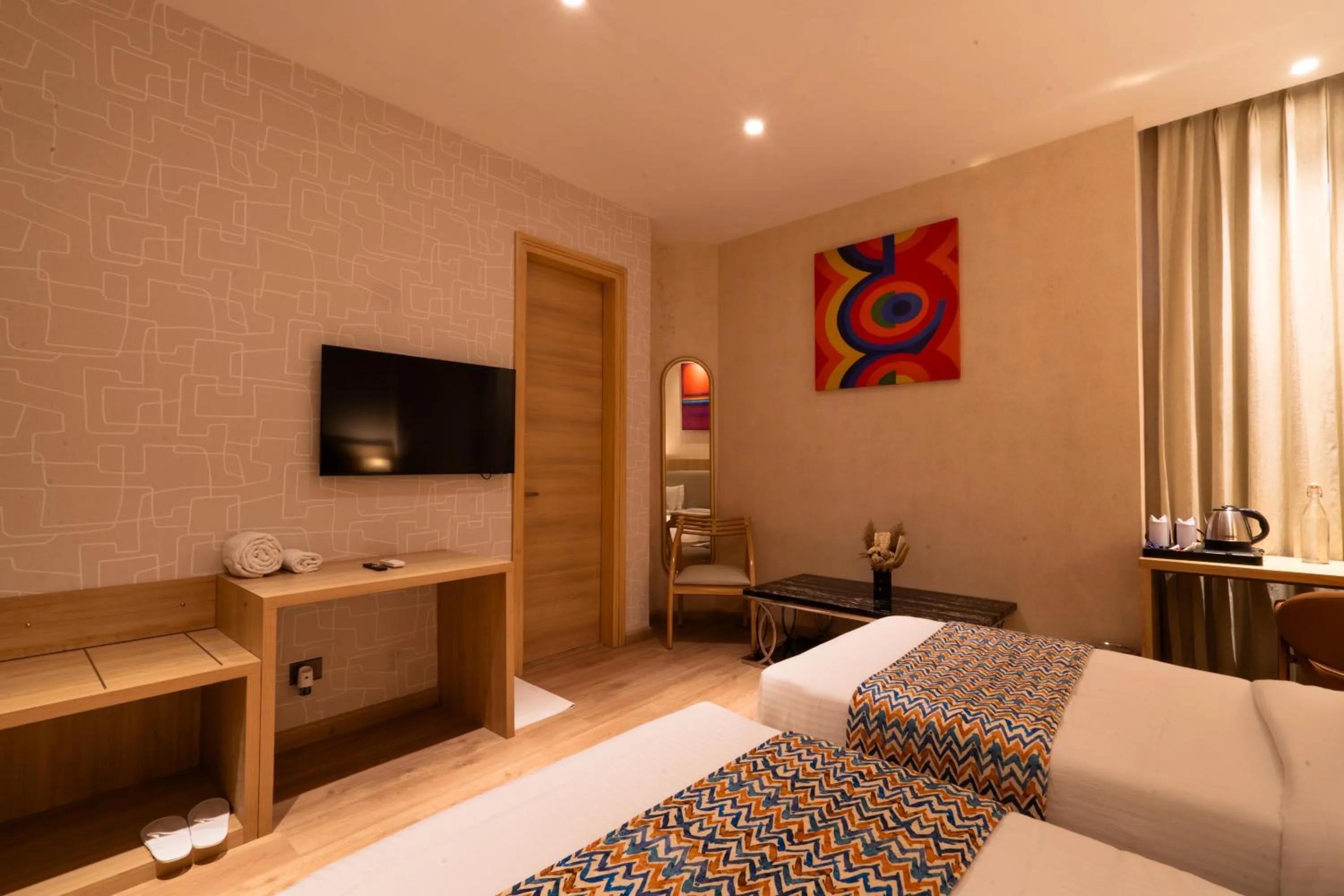 Photo of the whole room, Bed in Hotel Bluestone Prime Nehru Place by The Cosy hotels