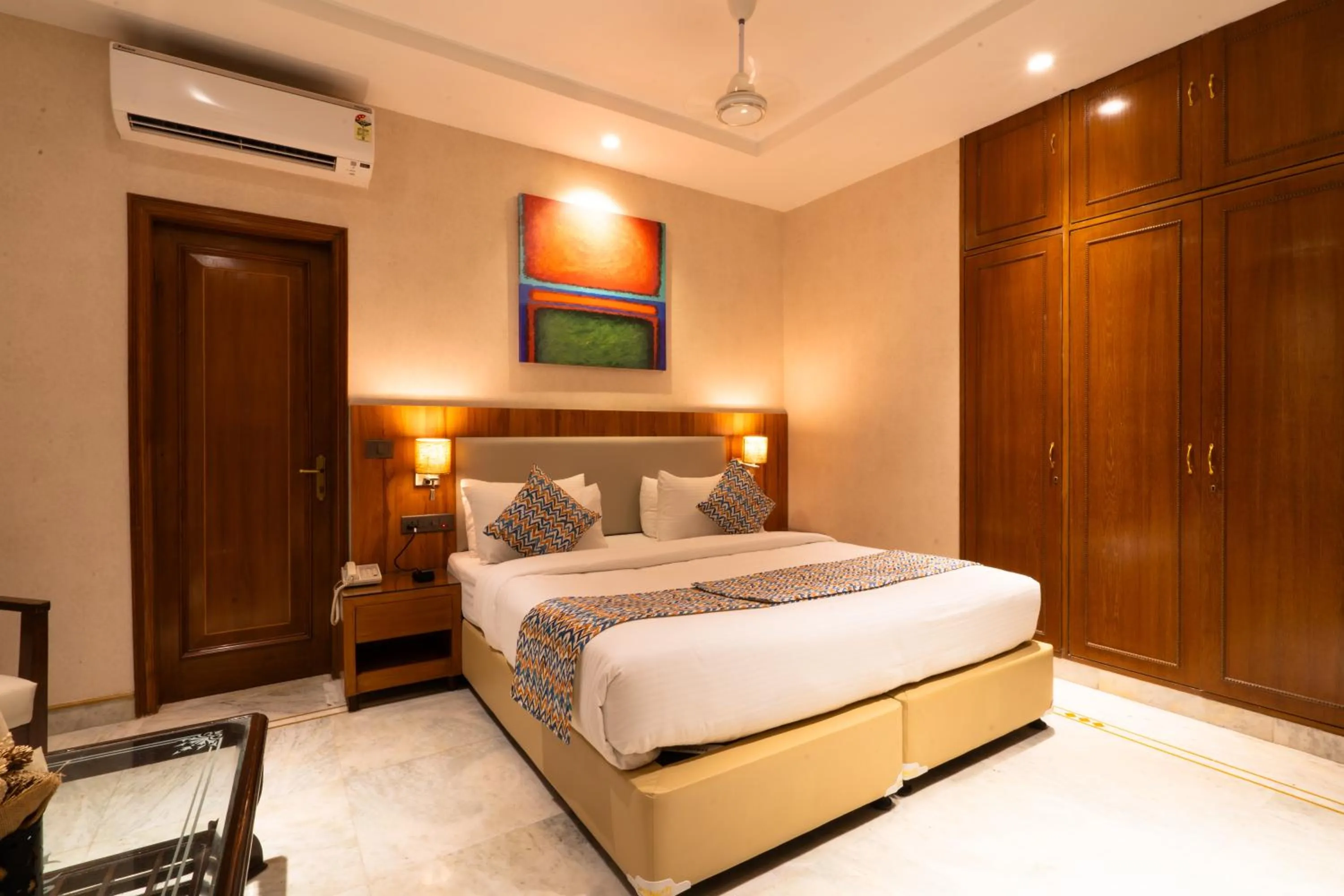 Photo of the whole room, Bed in Hotel Bluestone Prime Nehru Place by The Cosy hotels
