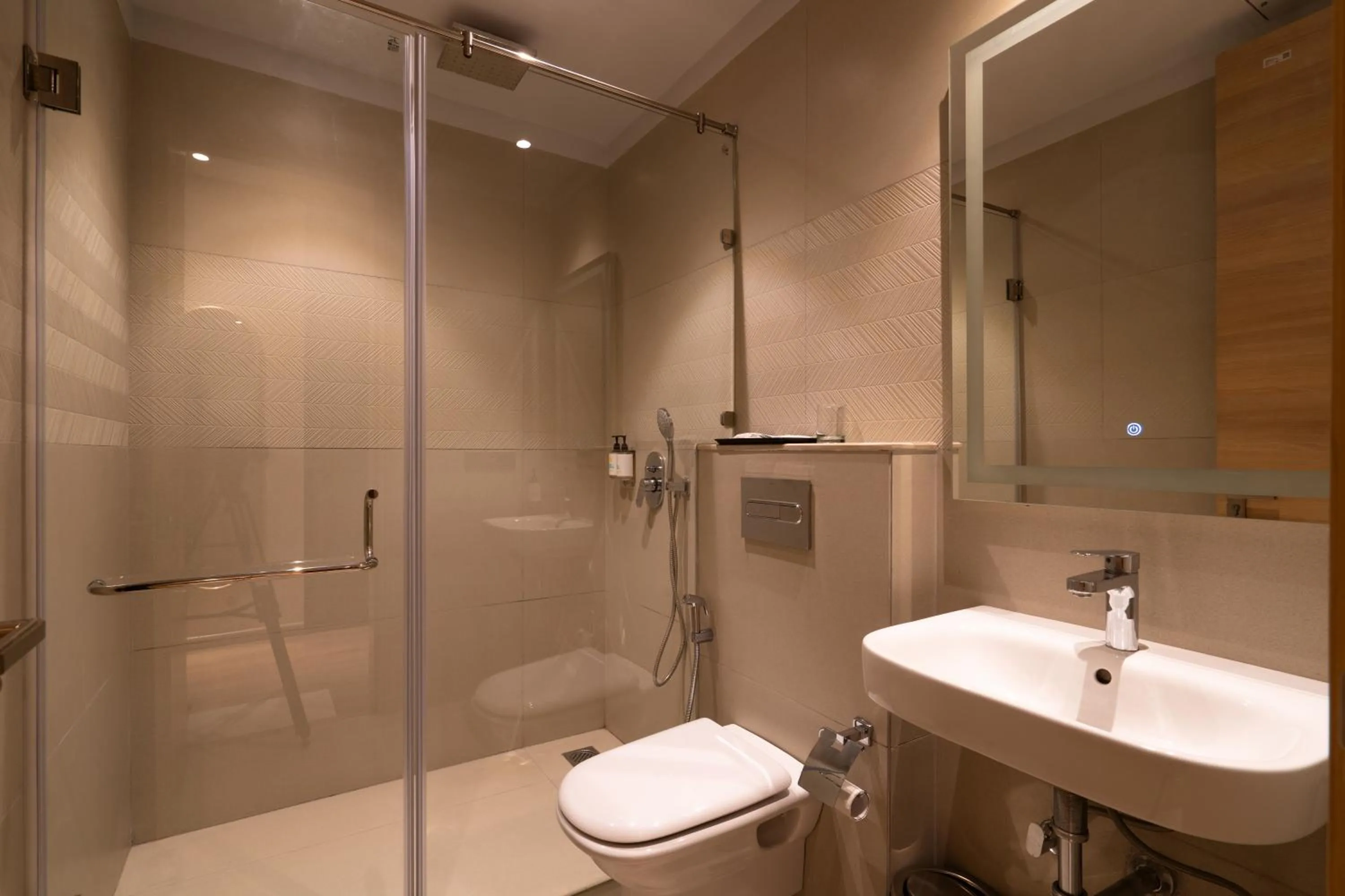 Bathroom in Hotel Bluestone Prime Nehru Place by The Cosy hotels