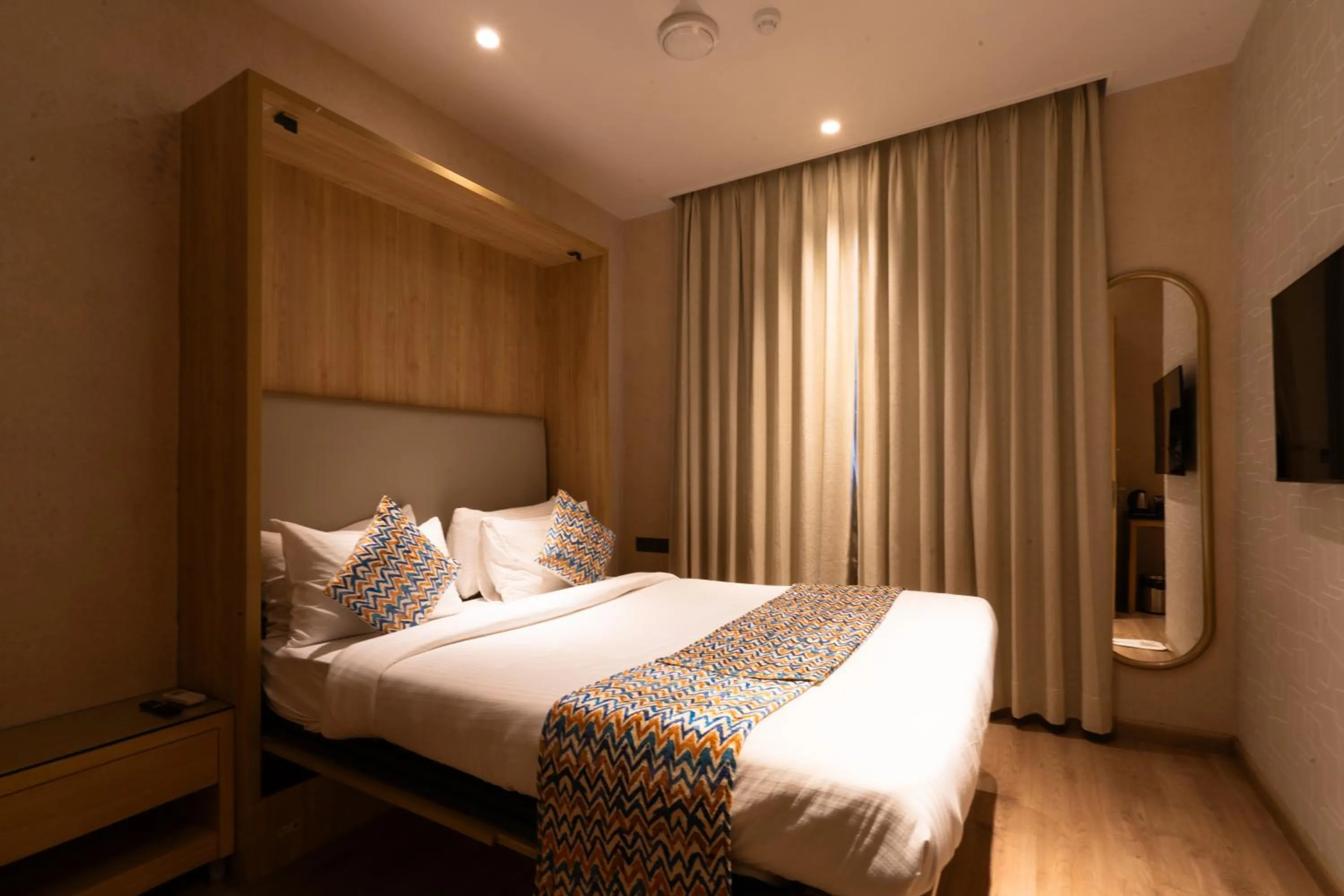 Bed in Hotel Bluestone Prime Nehru Place by The Cosy hotels