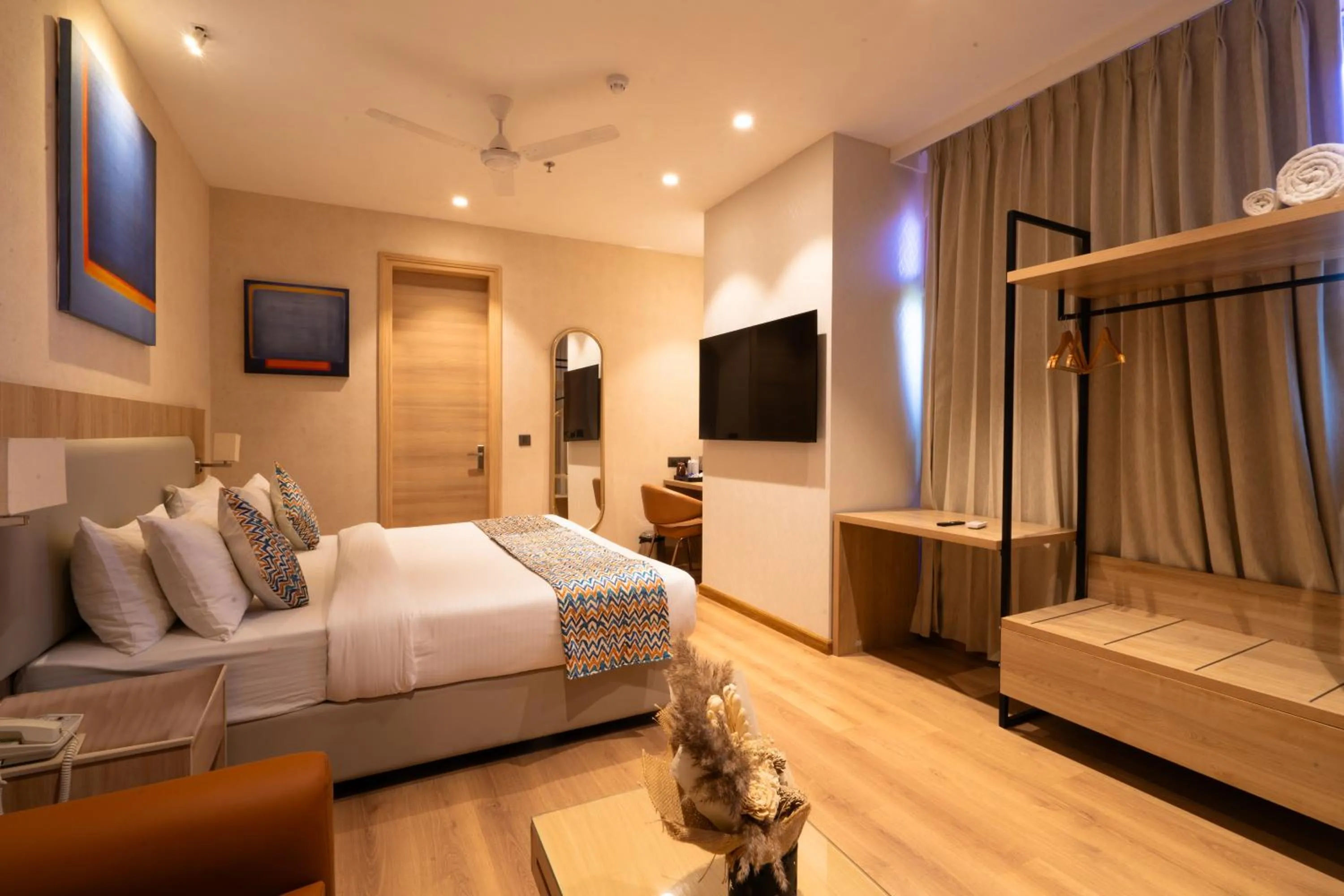 Photo of the whole room, Bed in Hotel Bluestone Prime Nehru Place by The Cosy hotels