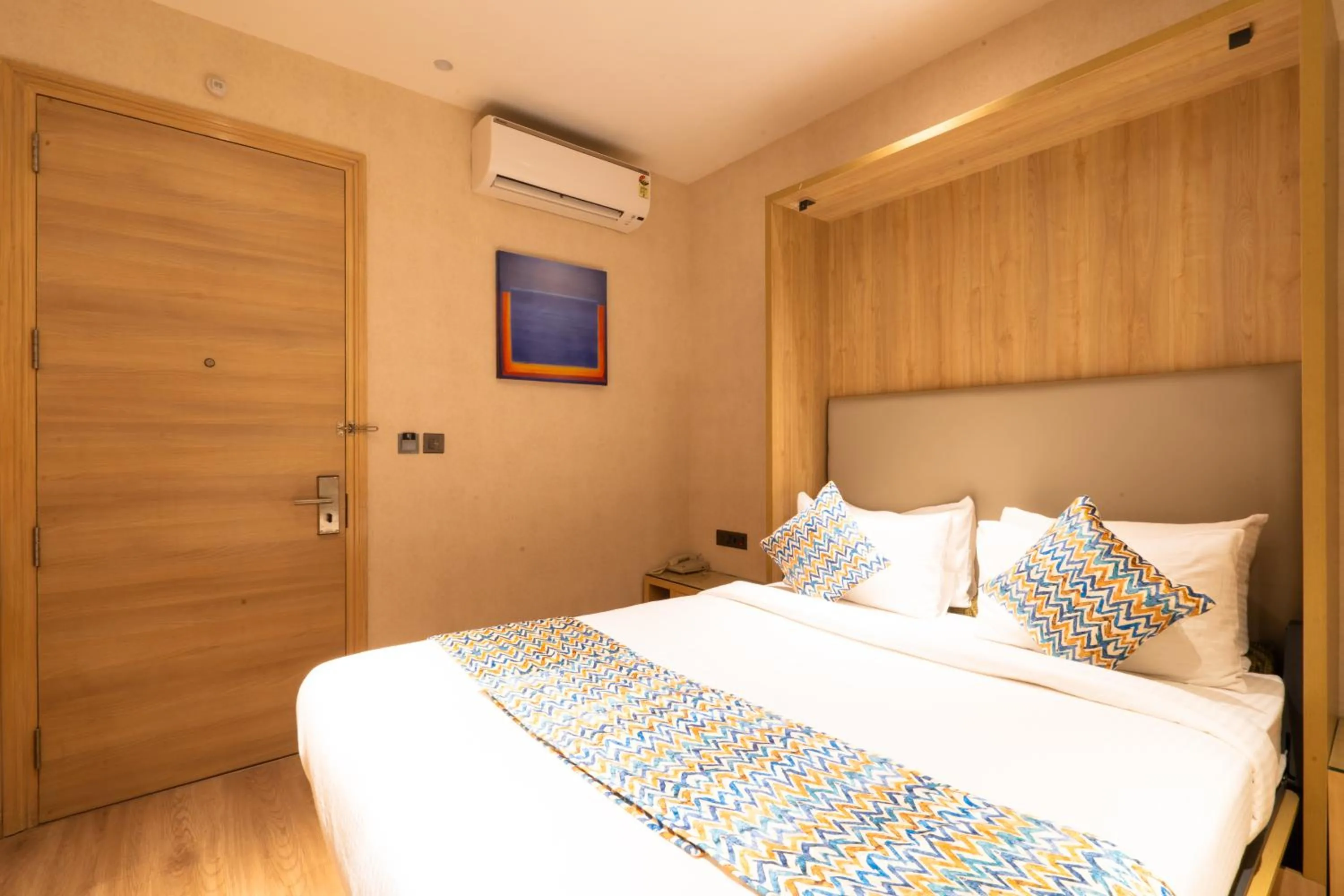 Bedroom, Bed in Hotel Bluestone Prime Nehru Place by The Cosy hotels