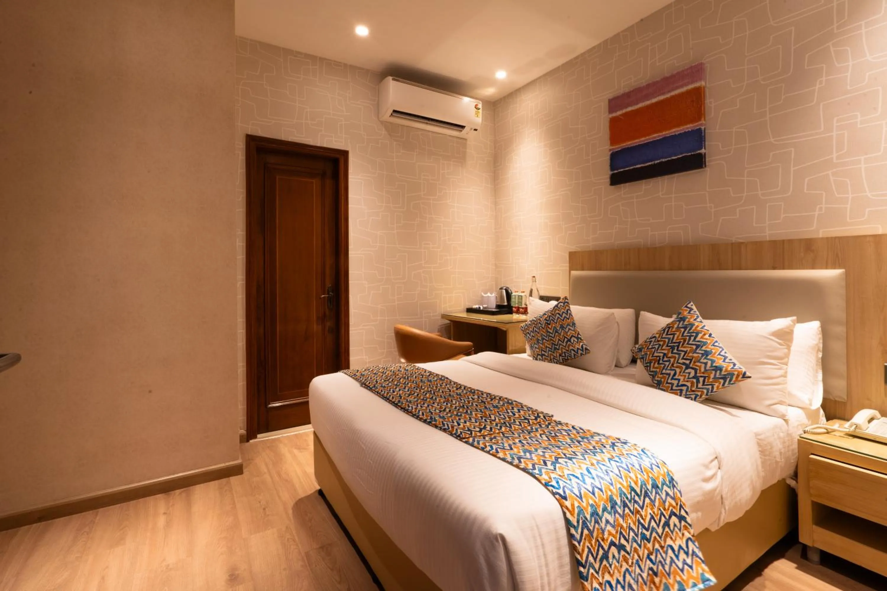 Bedroom, Bed in Hotel Bluestone Prime Nehru Place by The Cosy hotels