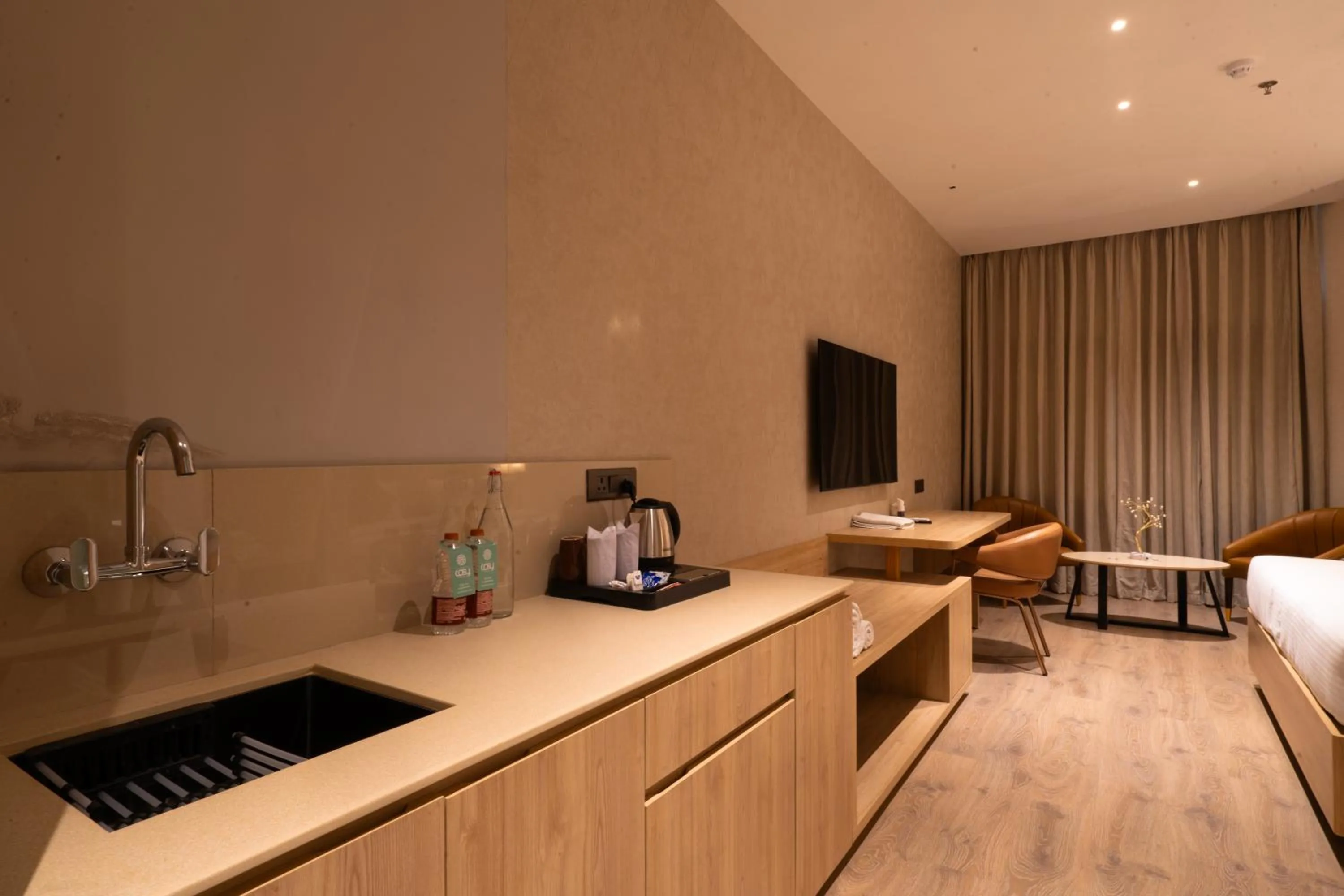 Photo of the whole room, Bed in Hotel Bluestone Prime Nehru Place by The Cosy hotels