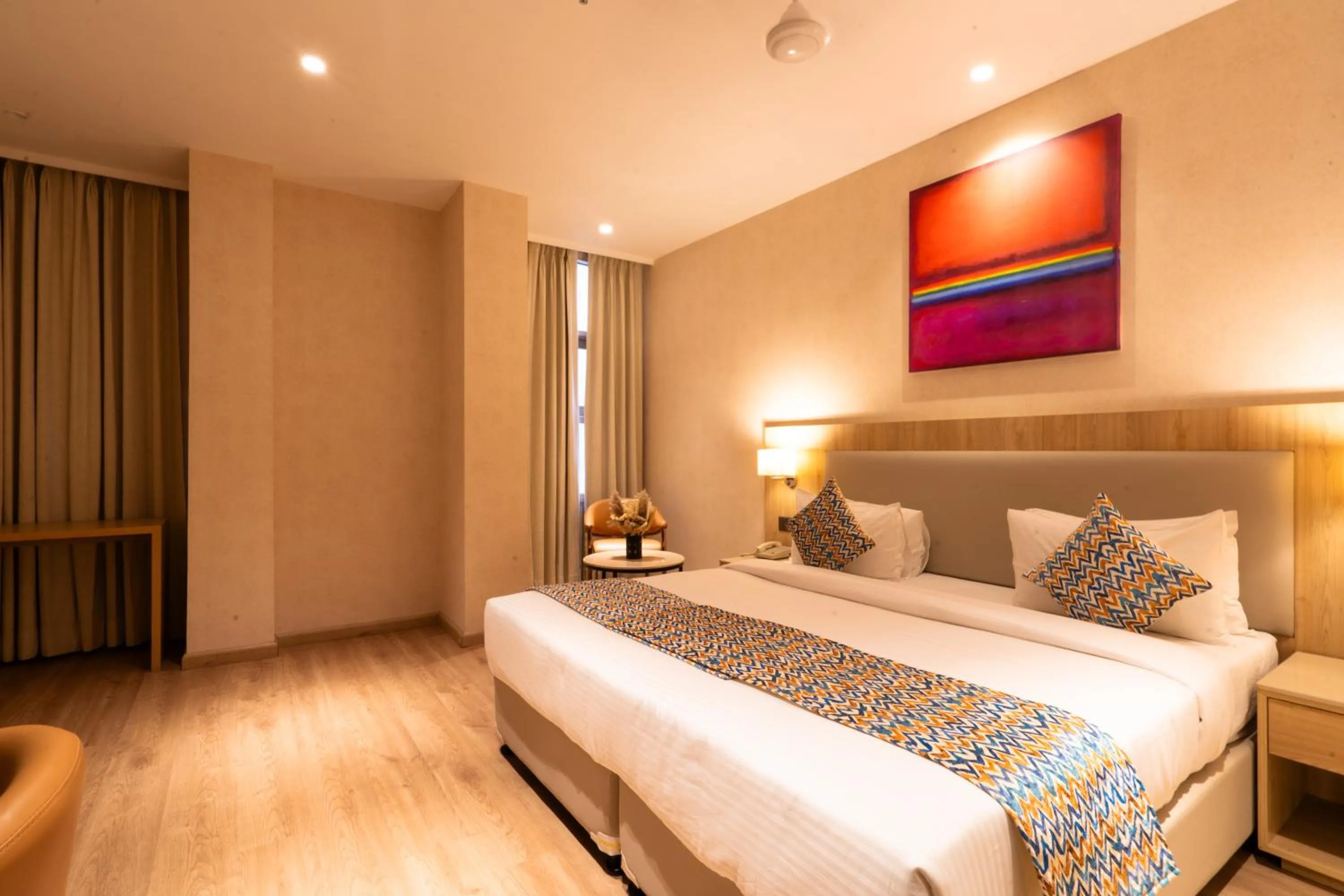 Photo of the whole room, Bed in Hotel Bluestone Prime Nehru Place by The Cosy hotels