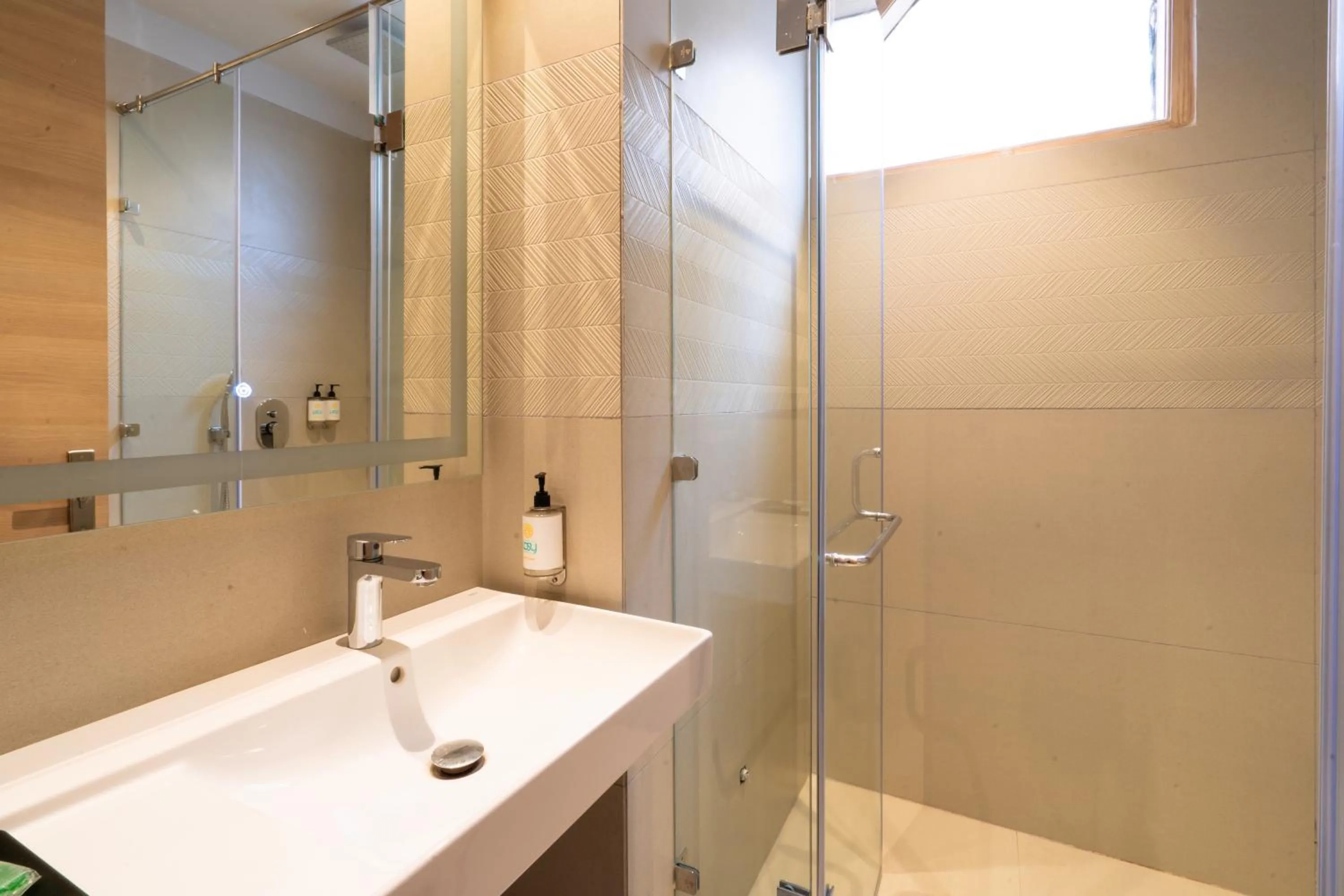 Bathroom in Hotel Bluestone Prime Nehru Place by The Cosy hotels