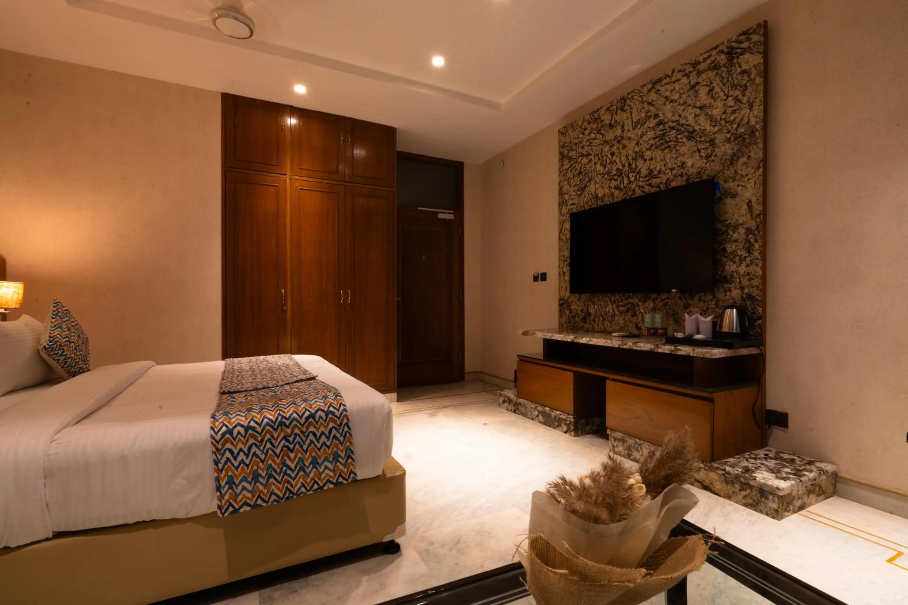 Photo of the whole room, Bed in Hotel Bluestone Prime Nehru Place by The Cosy hotels