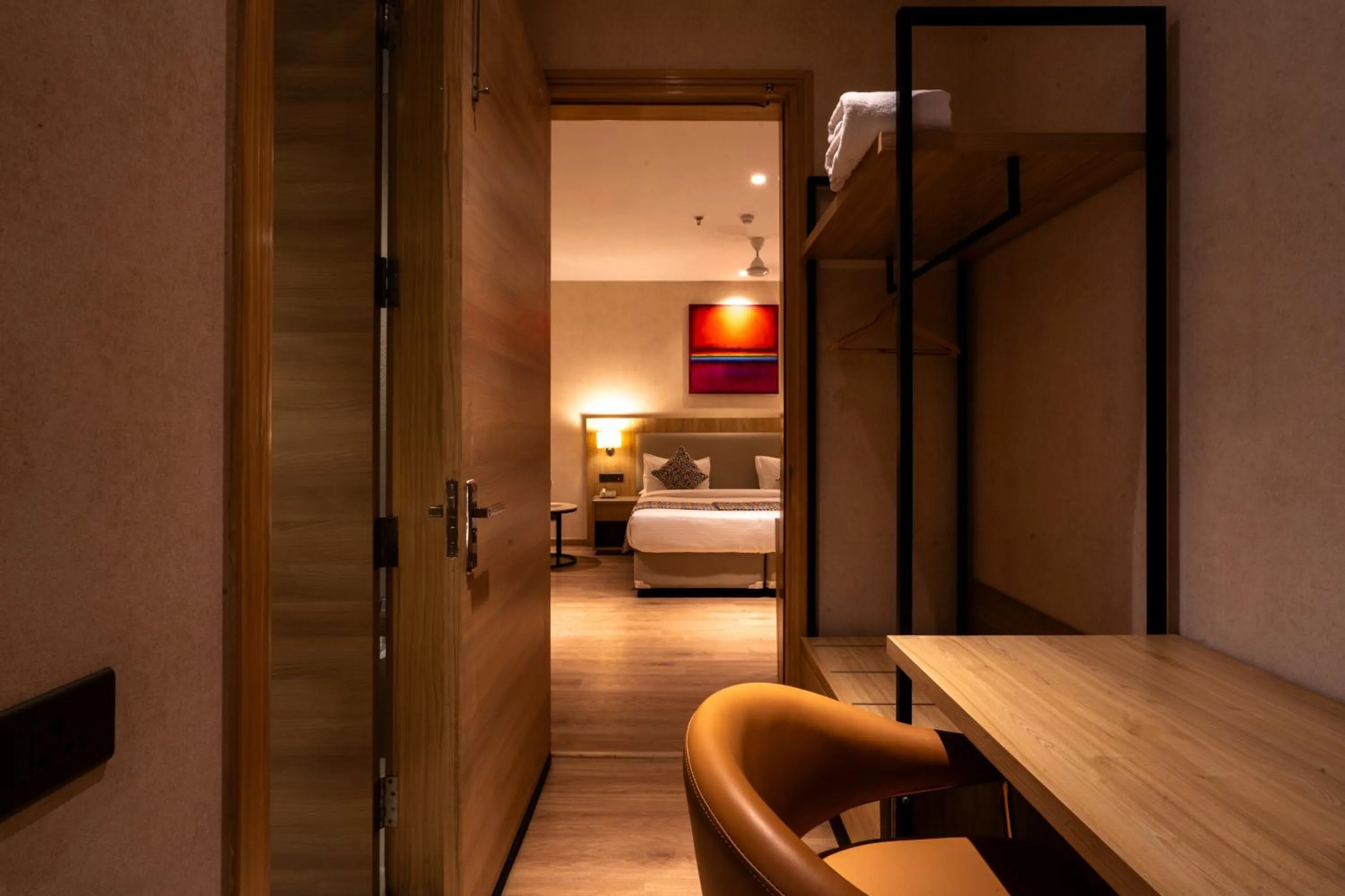 Photo of the whole room, Bed in Hotel Bluestone Prime Nehru Place by The Cosy hotels