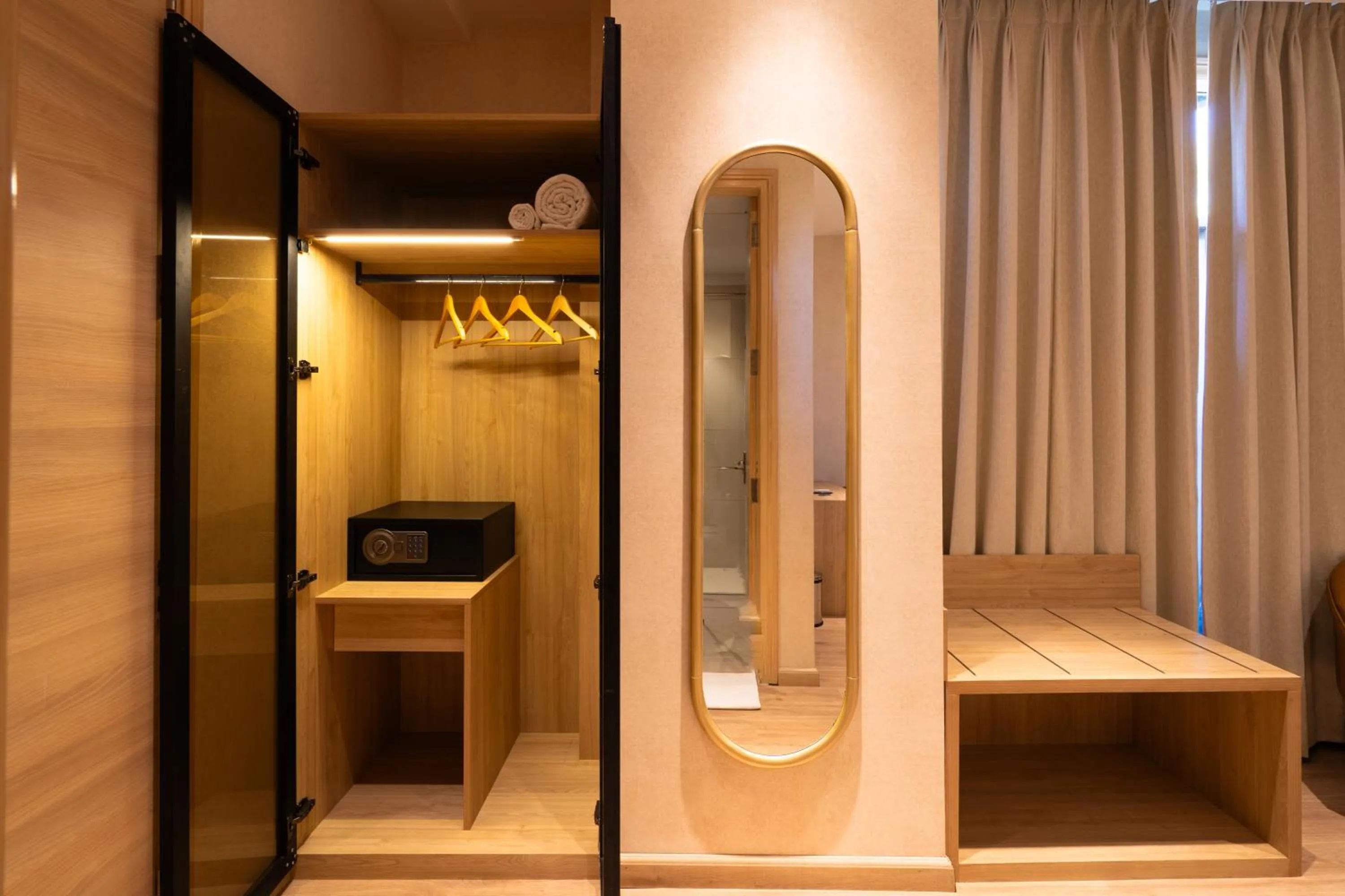 wardrobe in Hotel Bluestone Prime Nehru Place by The Cosy hotels