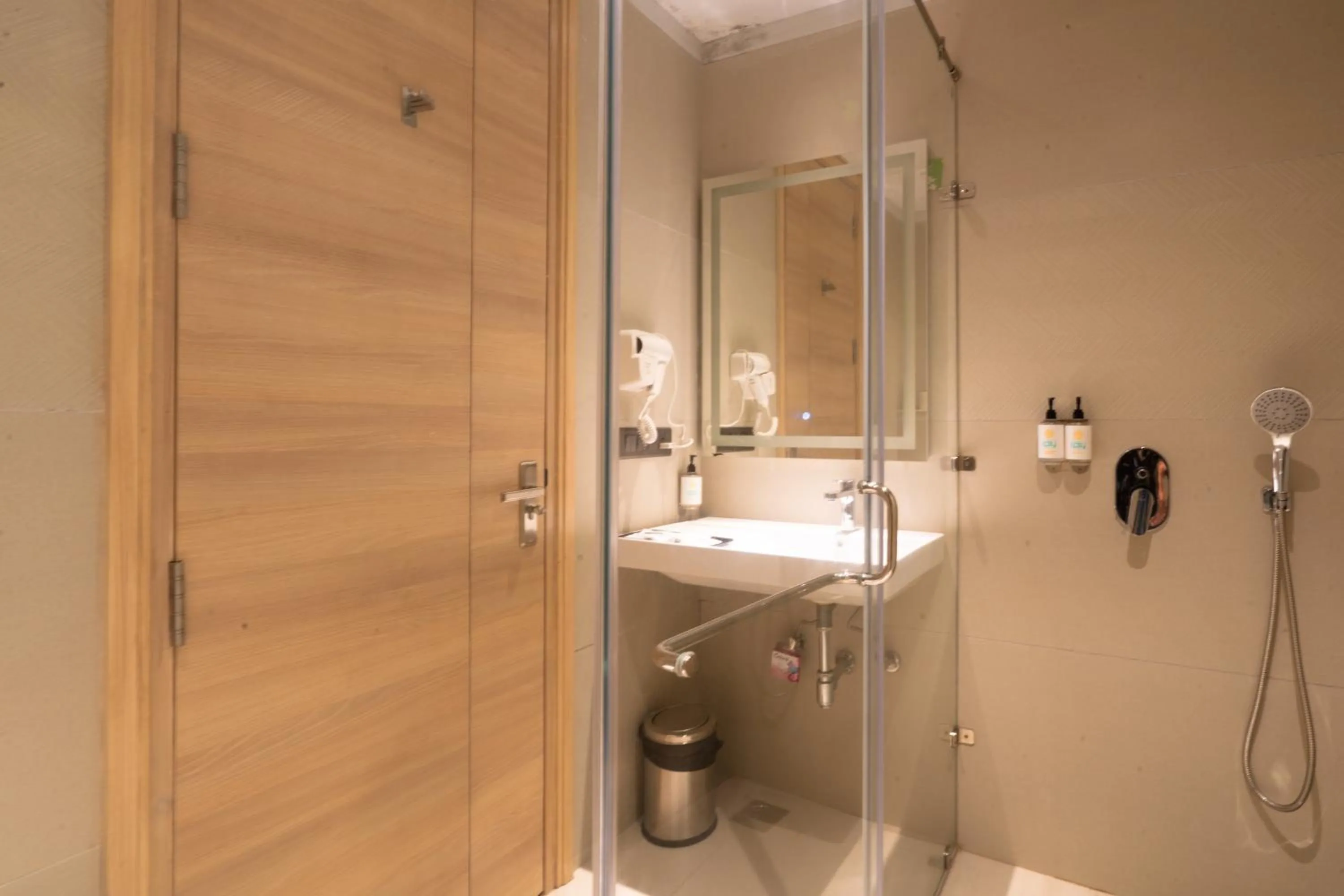 Shower in Hotel Bluestone Prime Nehru Place by The Cosy hotels