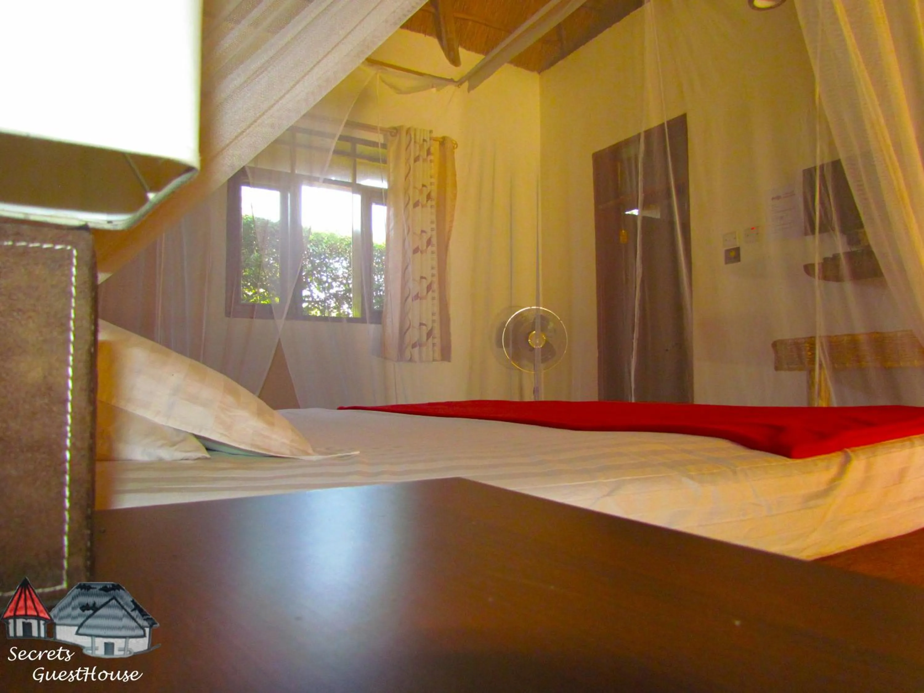 Bed in Secrets Guest House