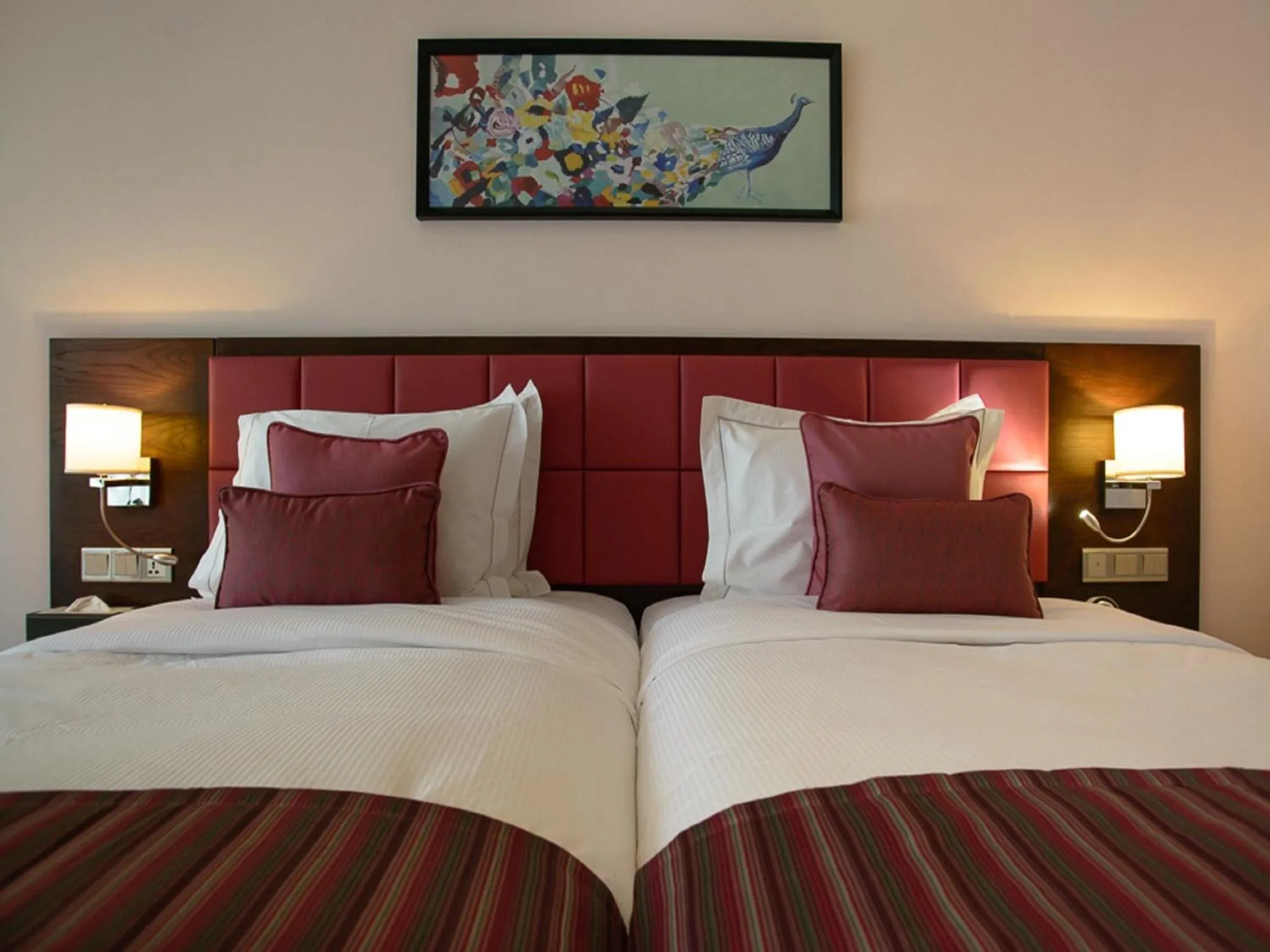 Bed in The Concord Hotel & Suites