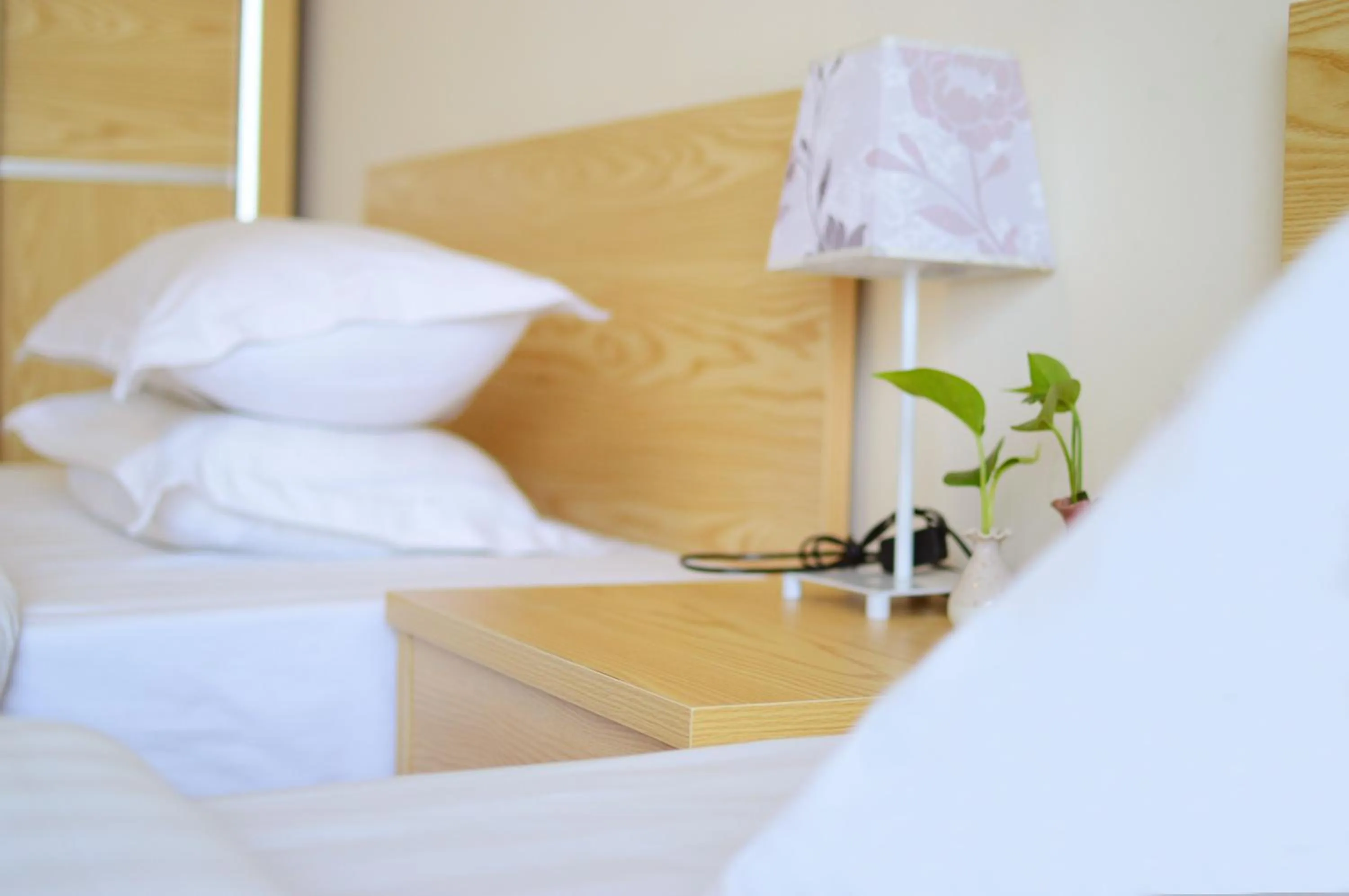 Decorative detail, Bed in Xizhengjia Apartment Hotel Pazhou Complex