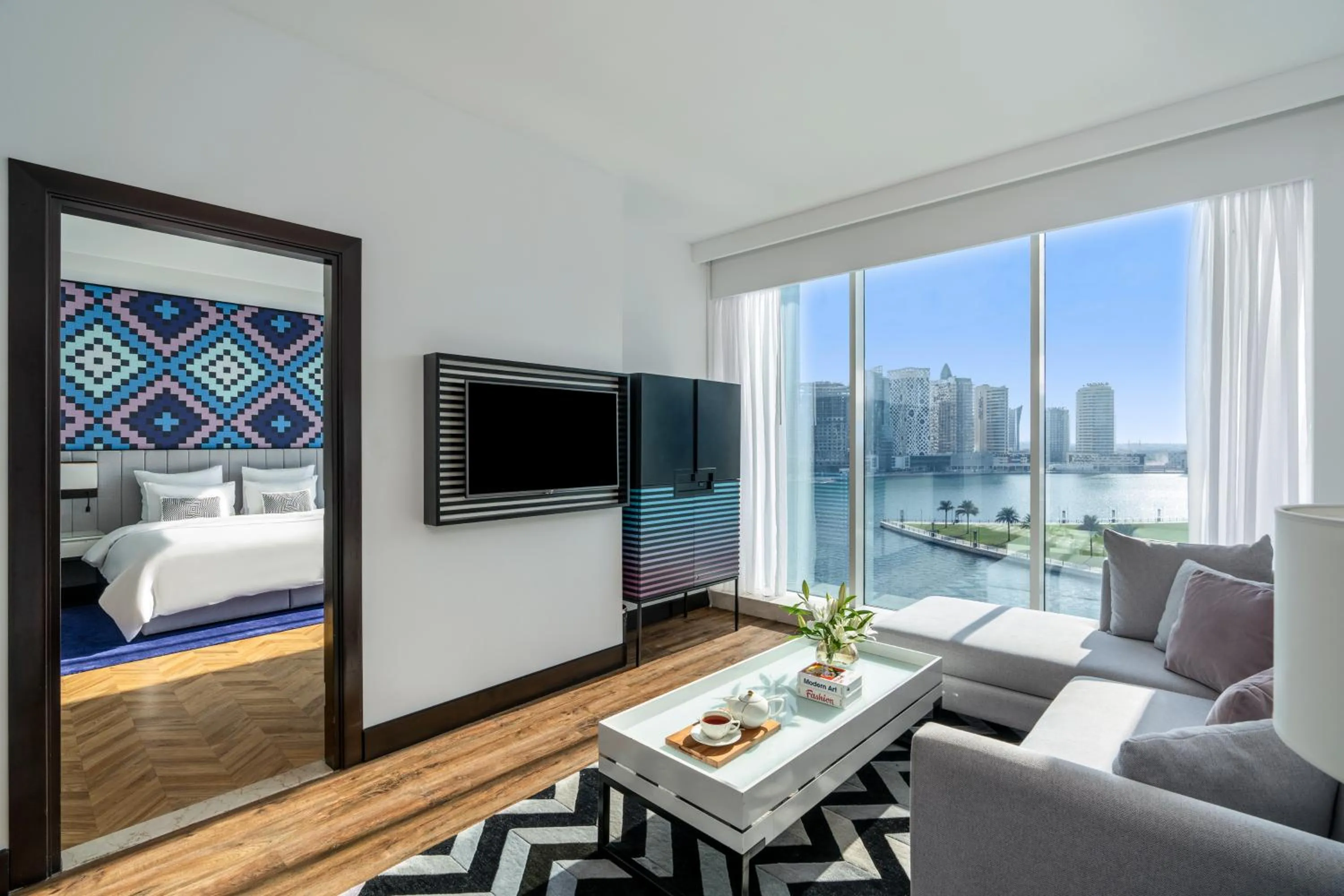 Living room, Bed in Pullman Dubai Downtown