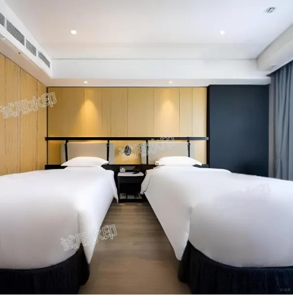 Bed in Jinyi Hotel Baotou Rare Earth High-tech Zone