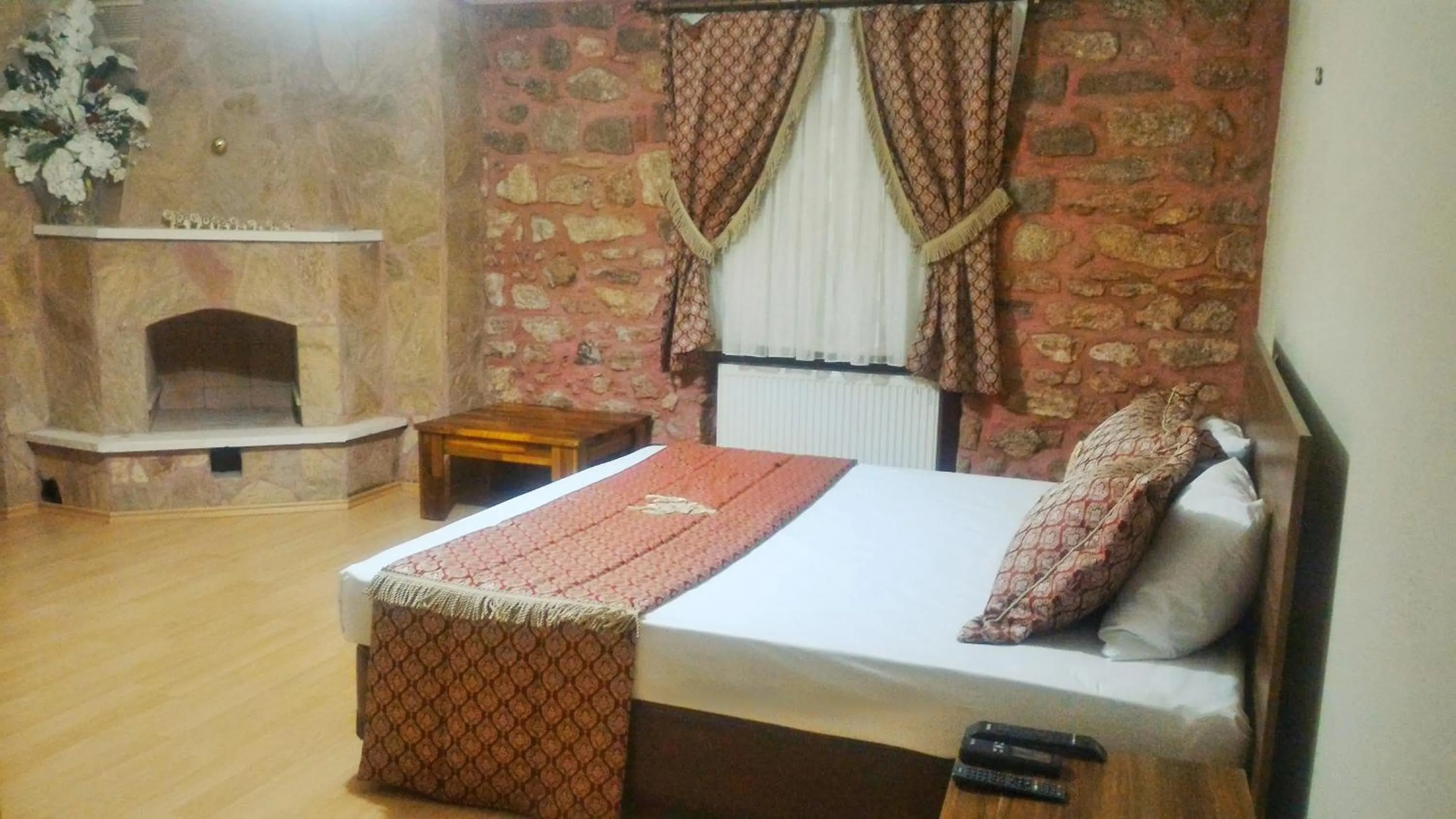Photo of the whole room, Bed in Odunluk Tas Konak Hotel