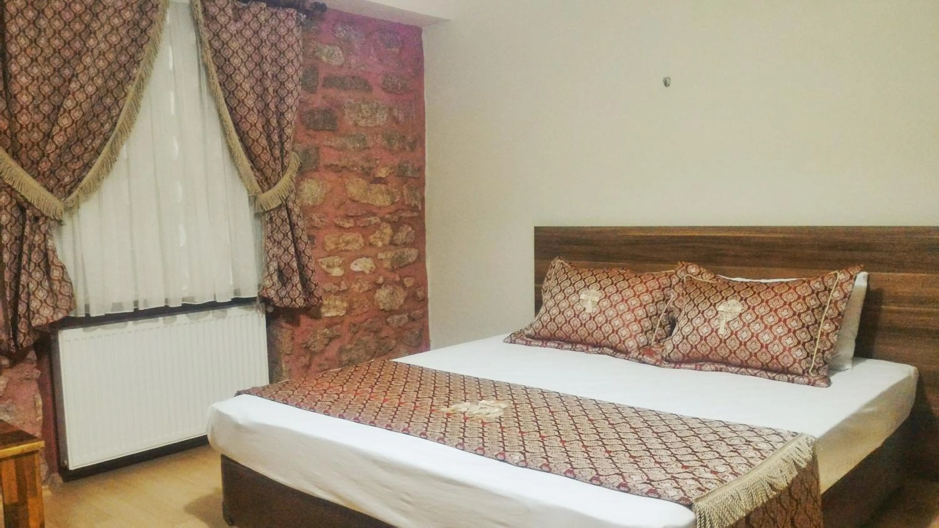 Photo of the whole room, Bed in Odunluk Tas Konak Hotel