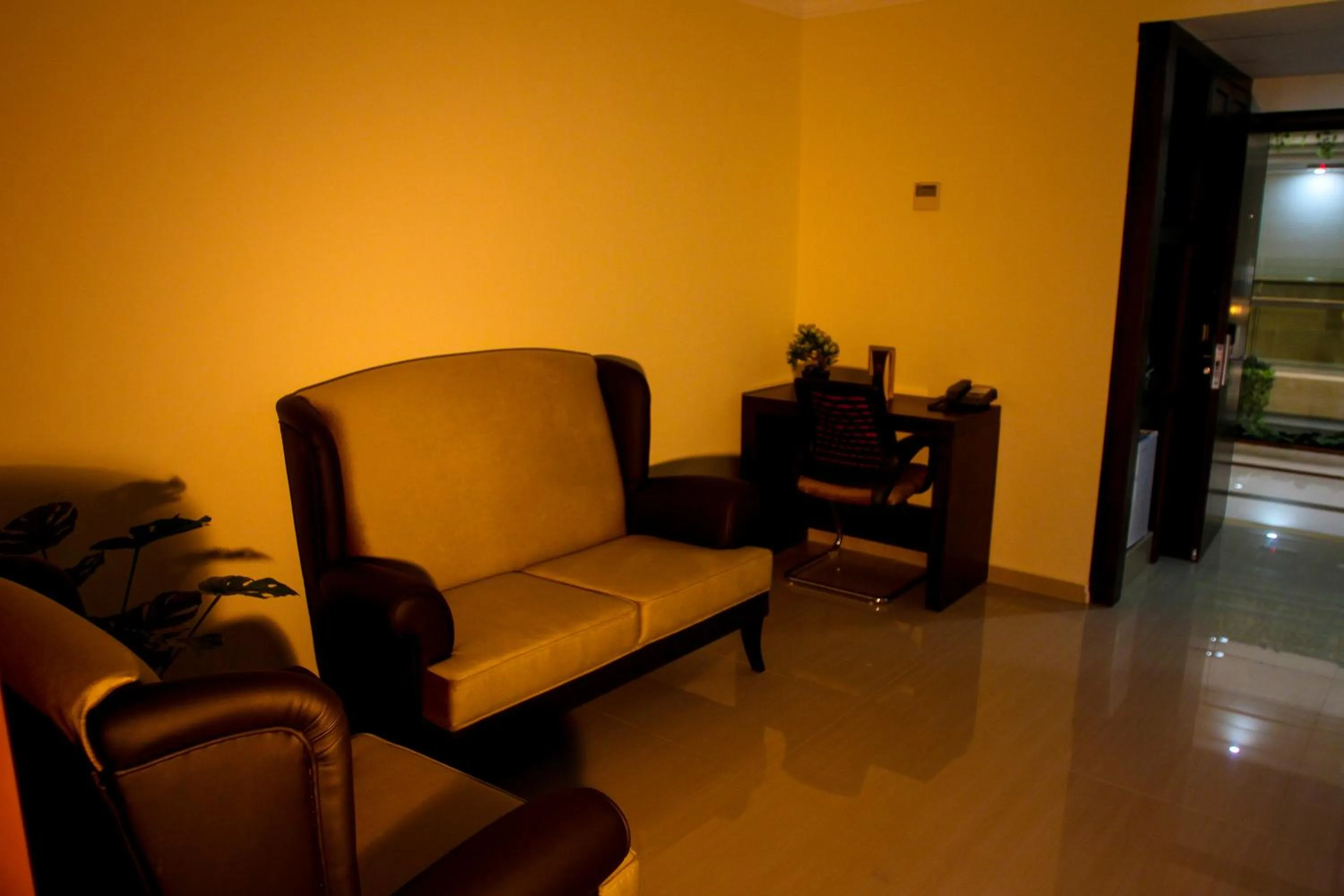 Seating area in Queen Plaza Hotel