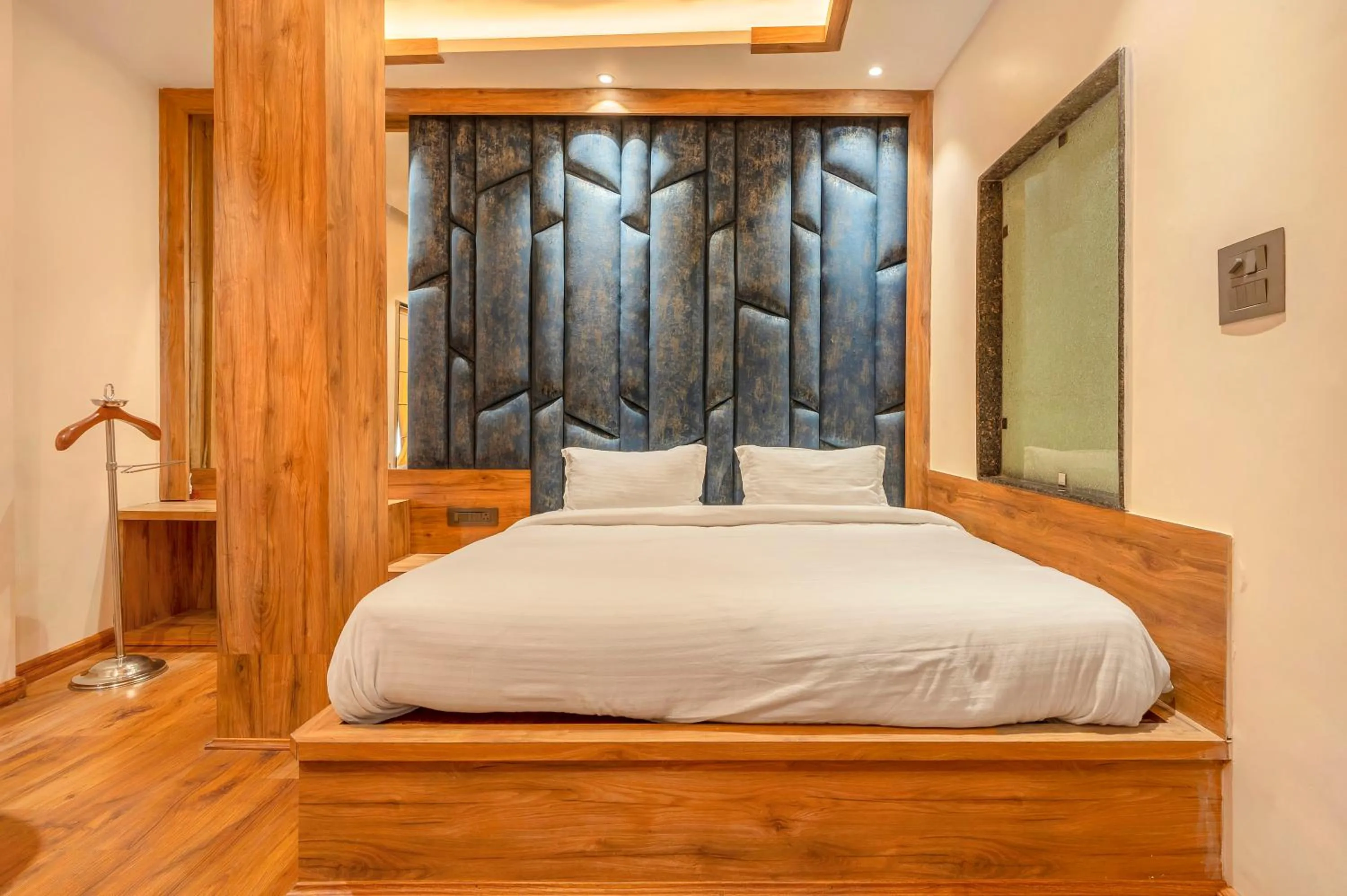 Bed in Madhuban Boutique Hotel