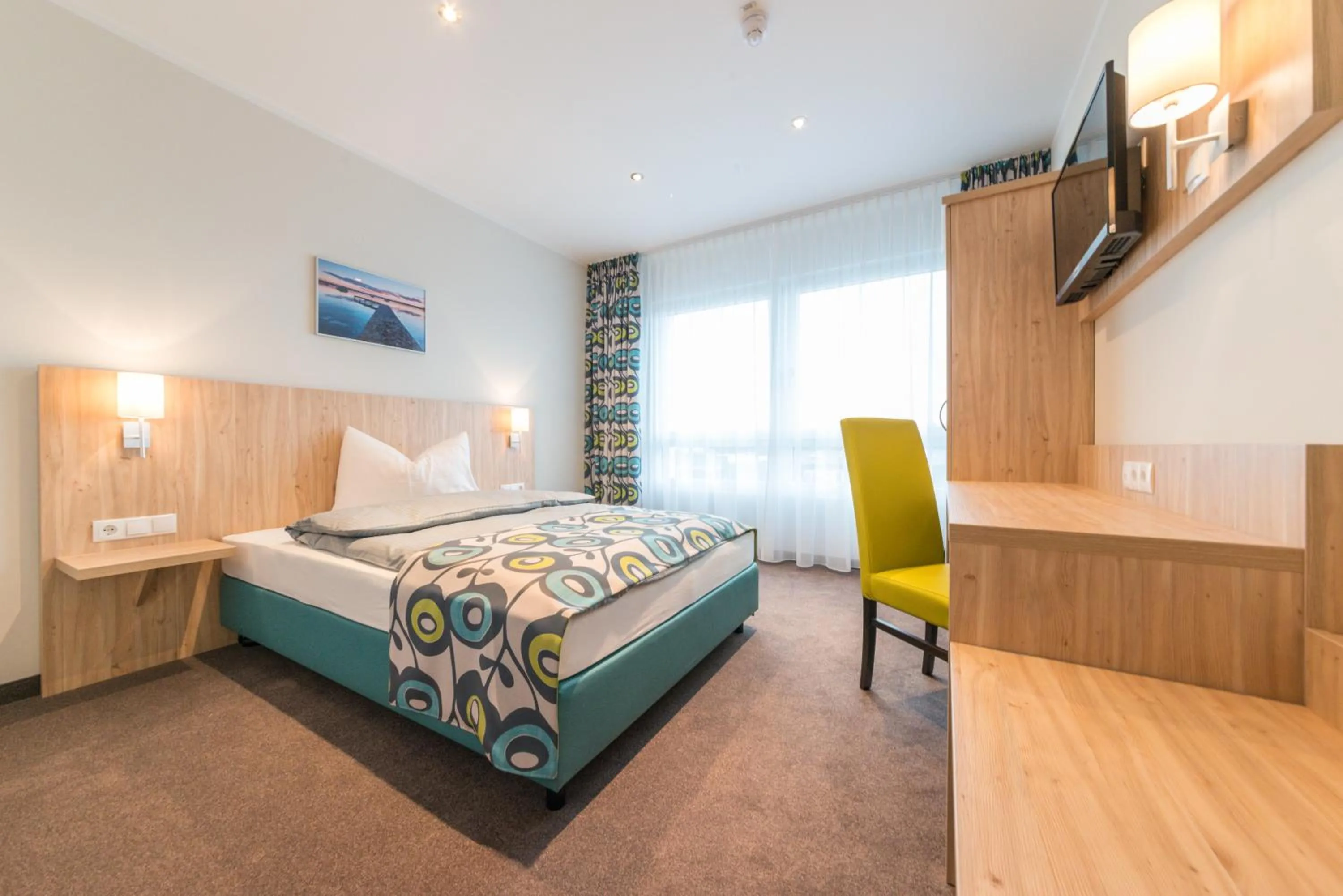 Photo of the whole room, Bed in Ammi Hotel Garni