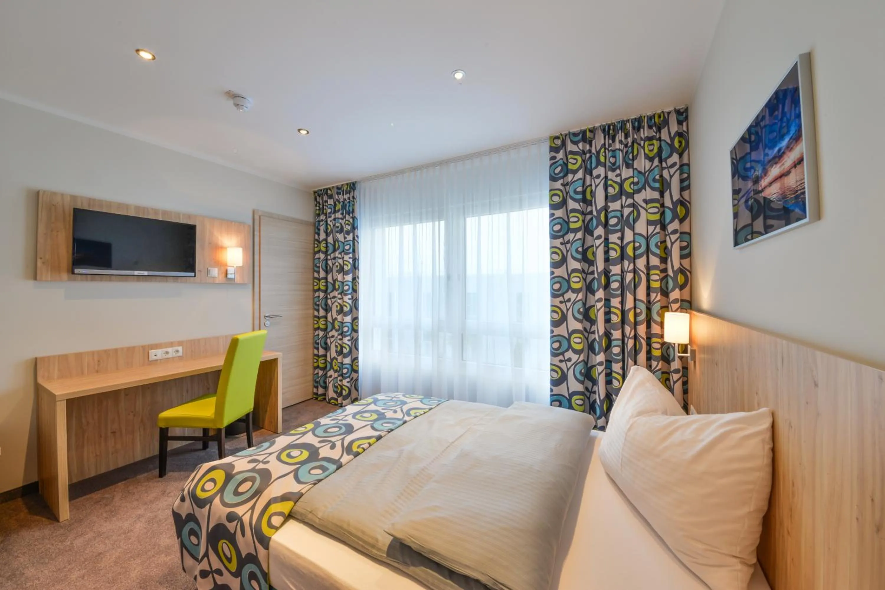 Photo of the whole room, Bed in Ammi Hotel Garni