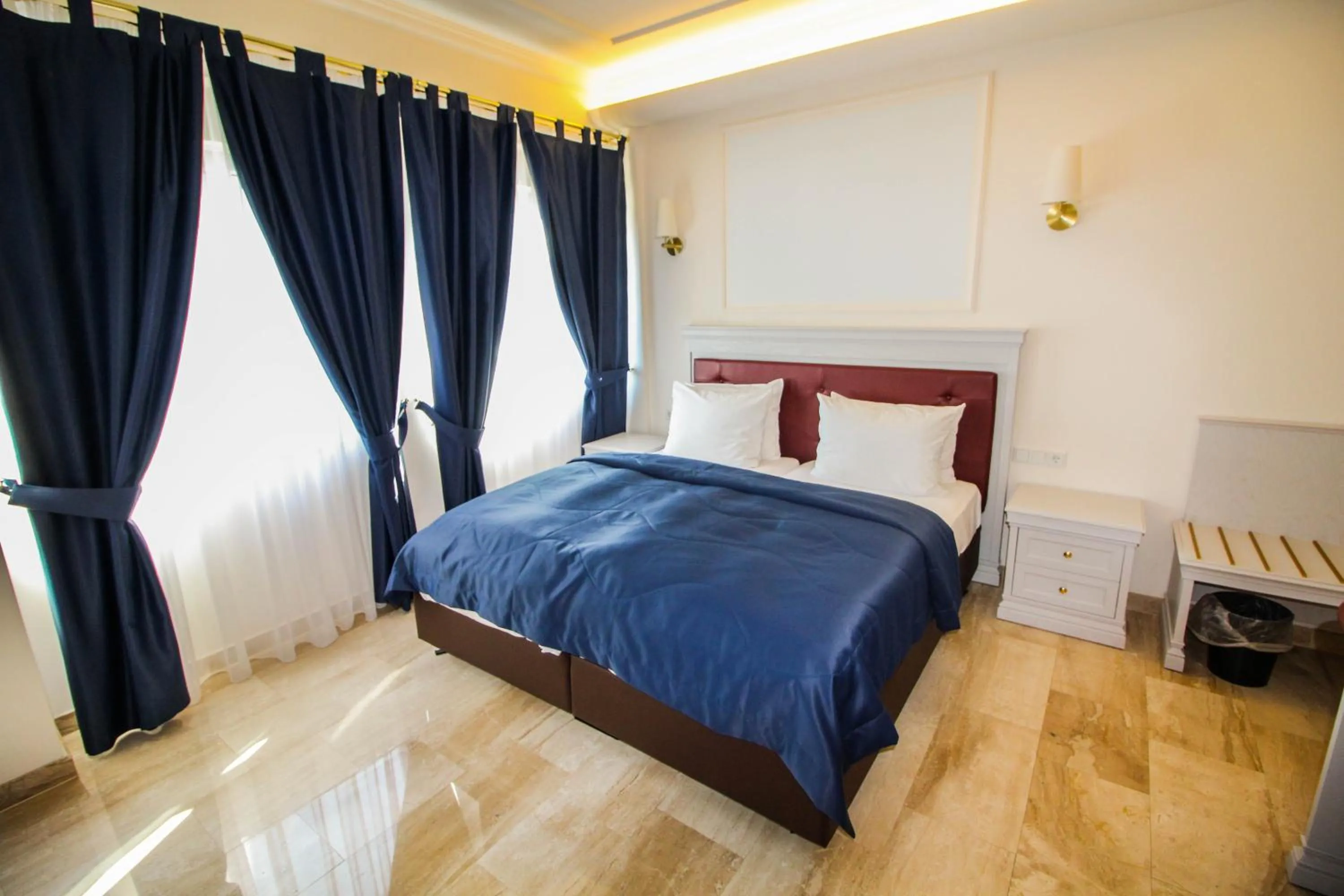 Bed in Grand Hotel Palladium