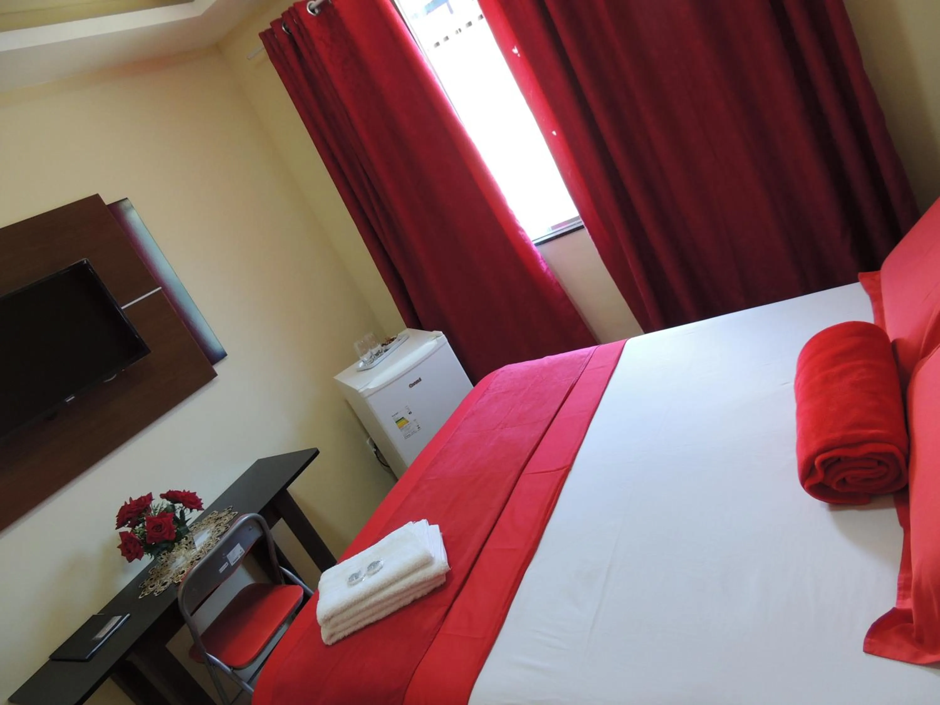 Bed in Quartos Em Casa In Caxias da Paraíso