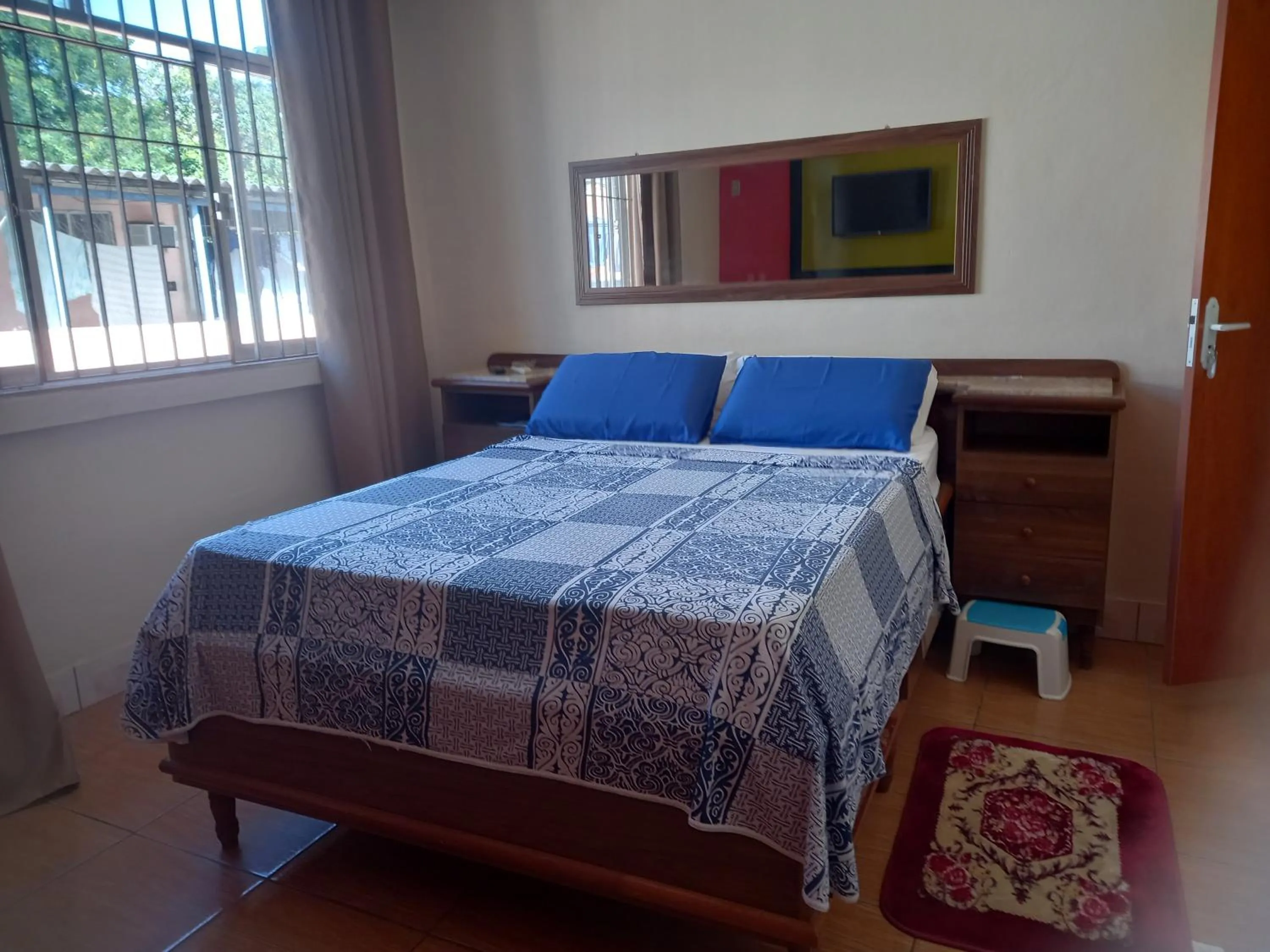 View (from property/room), Bed in Quartos Em Casa In Caxias da Paraíso