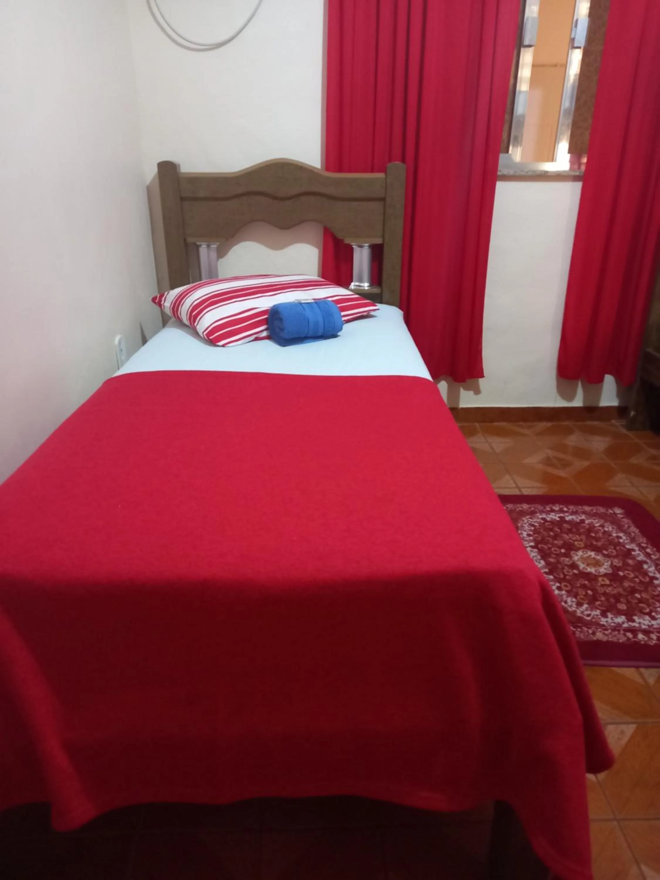 View (from property/room), Bed in Quartos Em Casa In Caxias da Paraíso