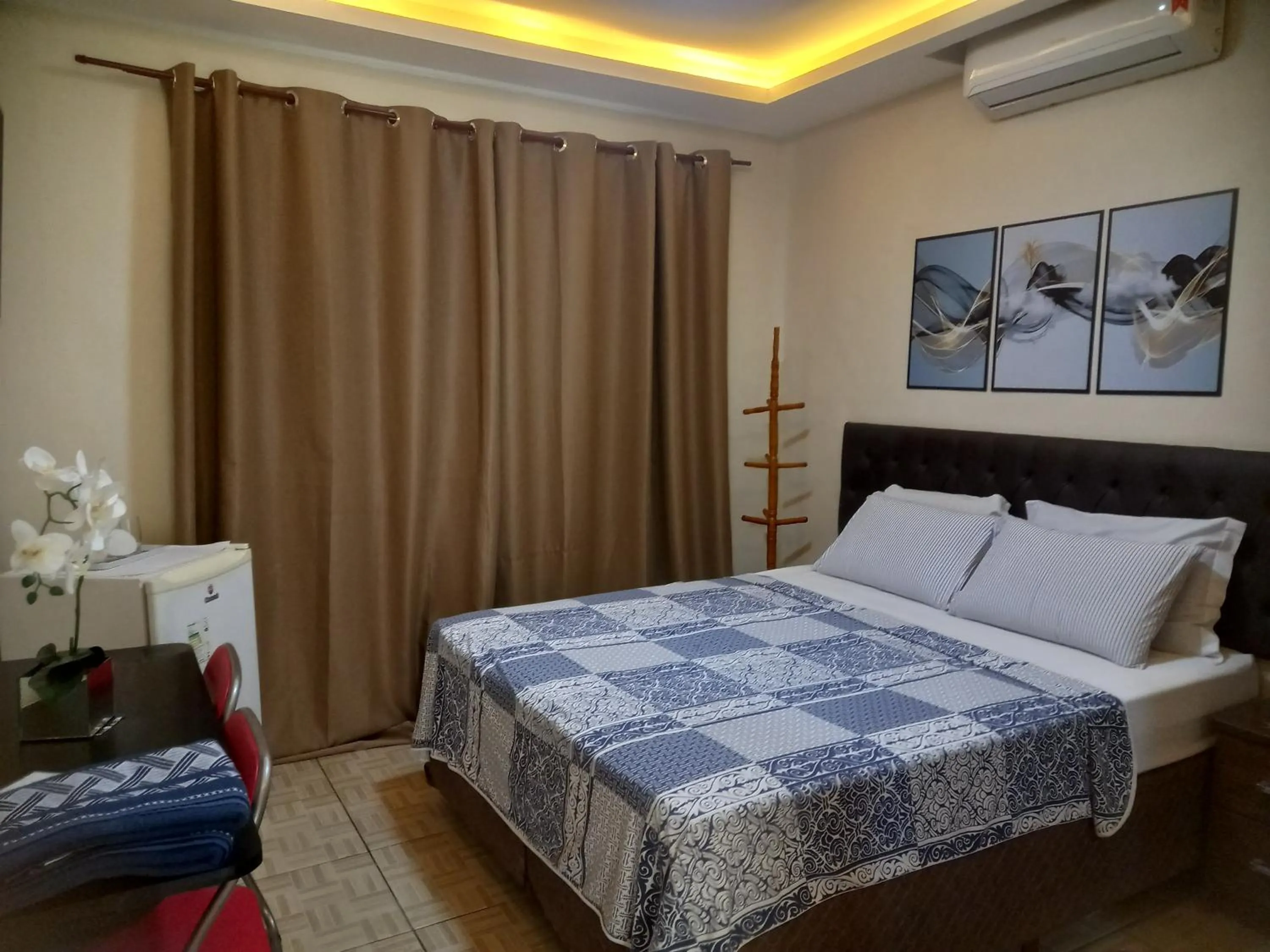 View (from property/room), Bed in Quartos Em Casa In Caxias da Paraíso