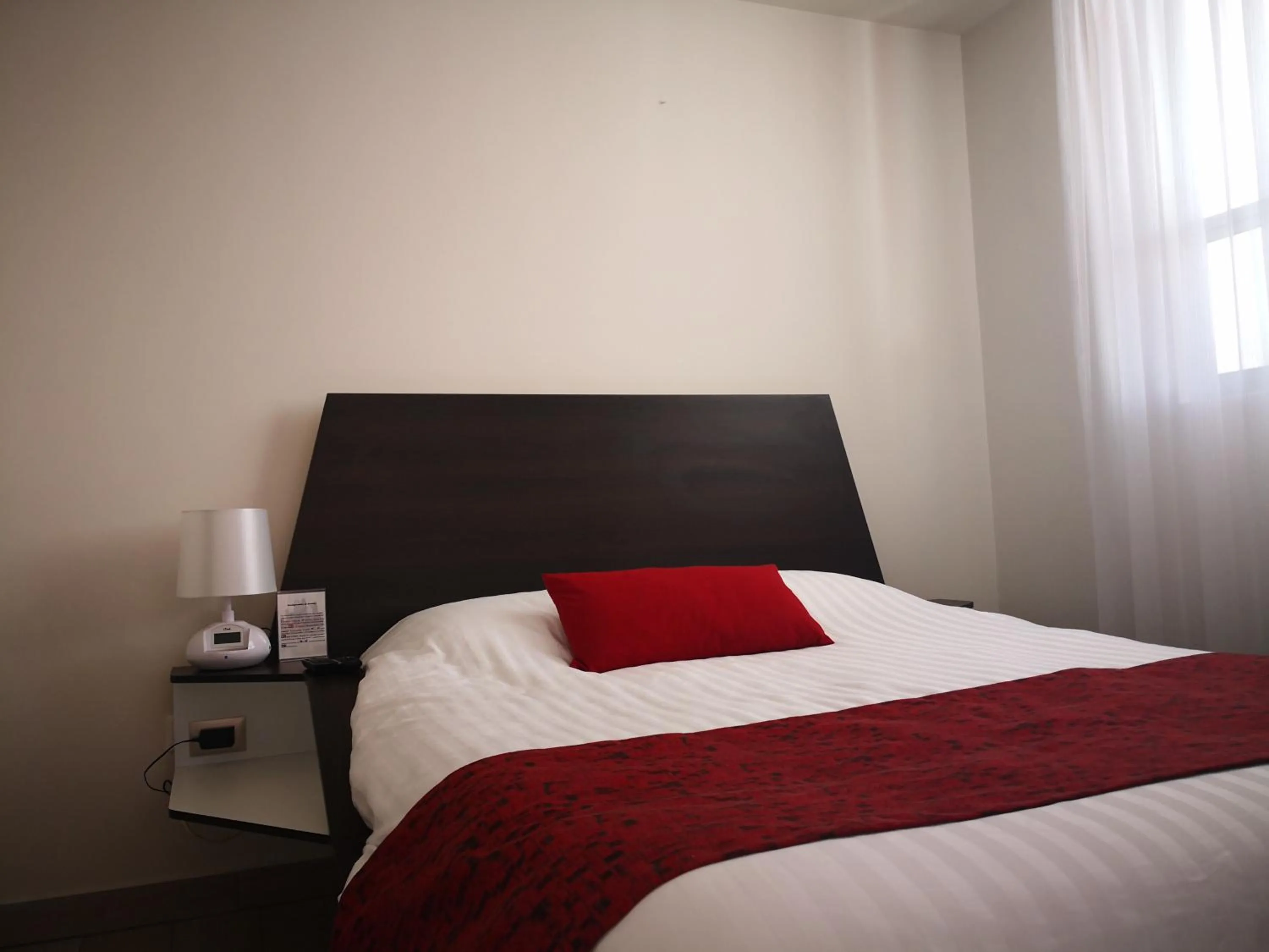 Bed in Metropolis Suites Ejecutivas