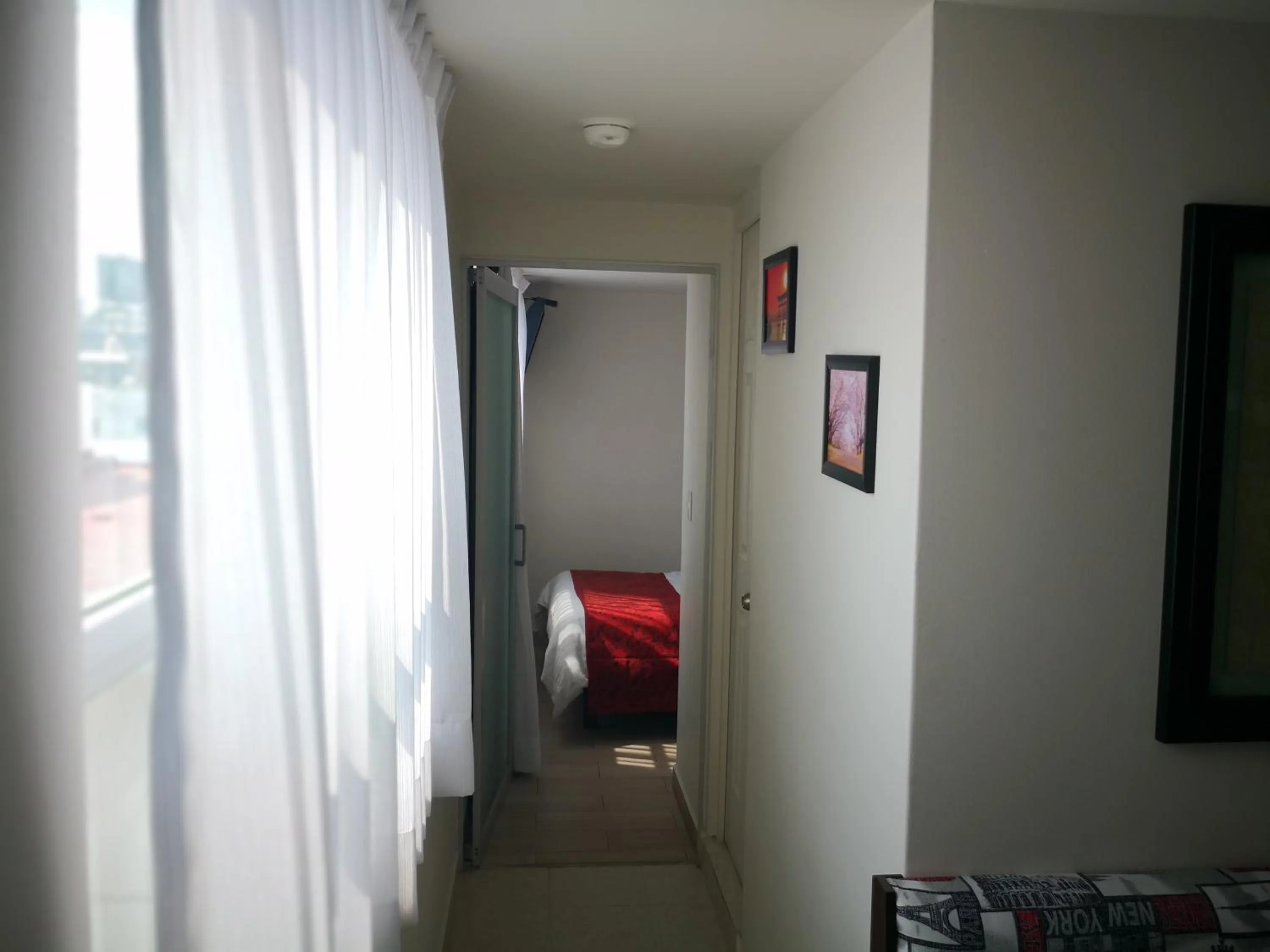 Bedroom in Metropolis Suites Ejecutivas