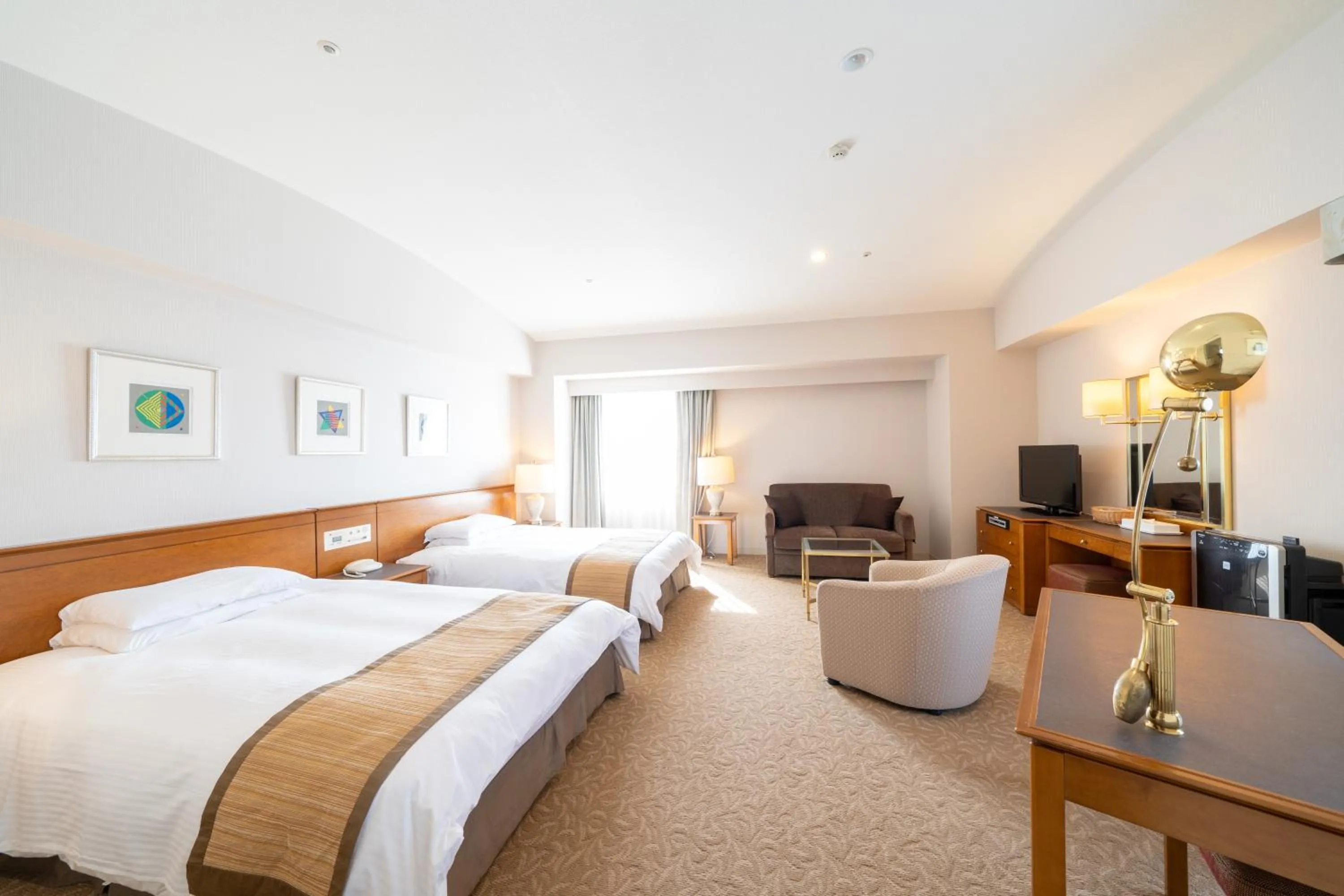 Living room, Bed in Hotel Terrace The Square Hitachi