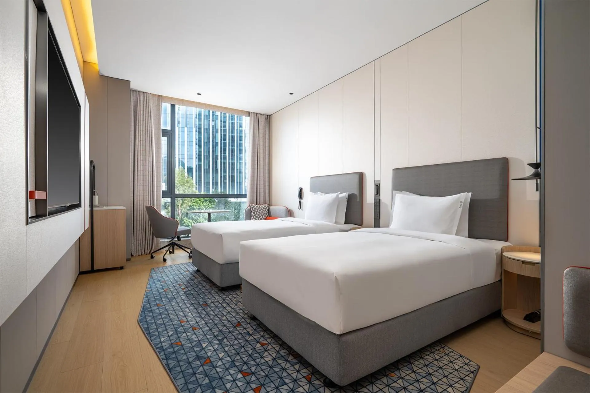 Photo of the whole room, Bed in Holiday Inn Express Shenzhen Sports Center by IHG