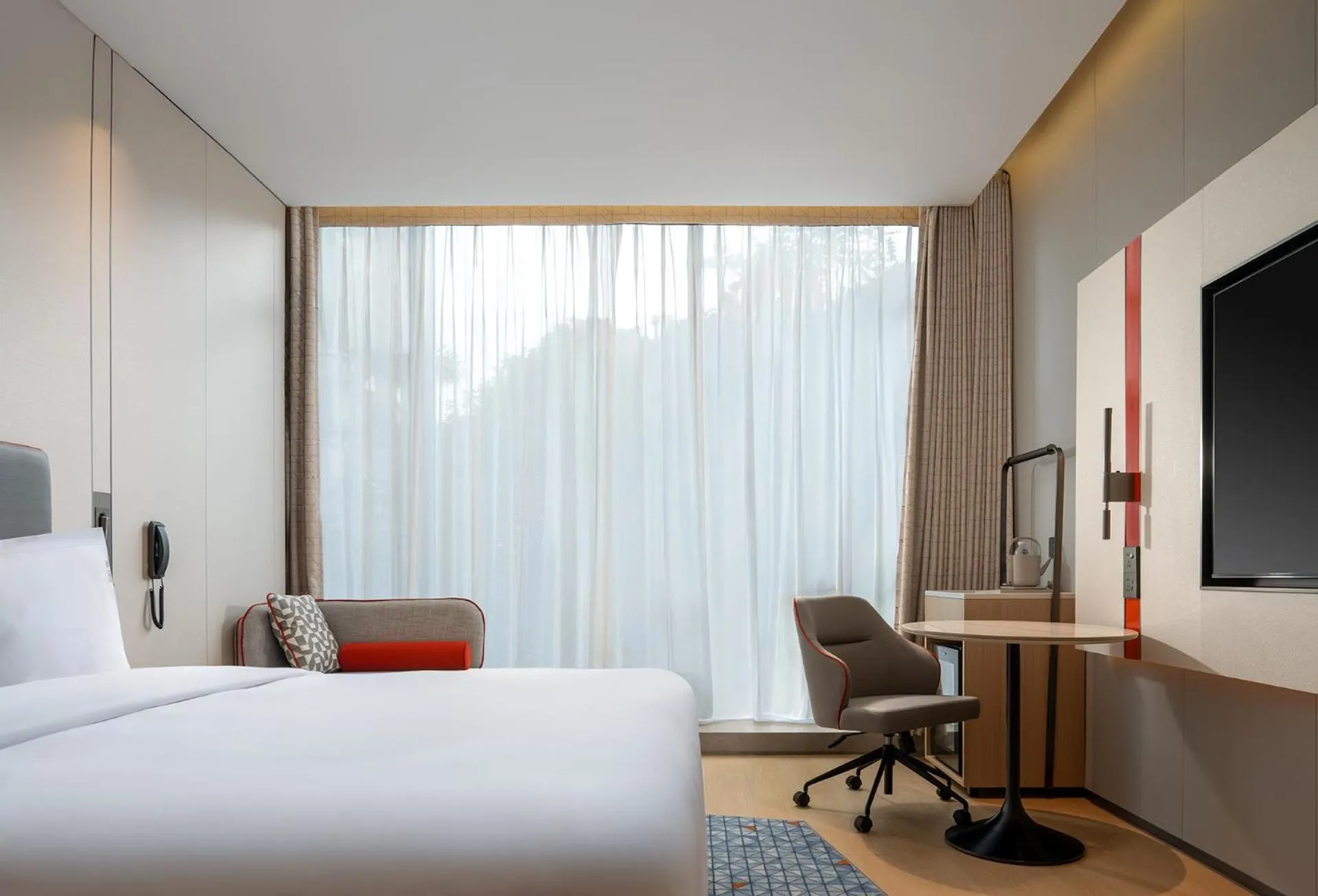 Photo of the whole room, Bed in Holiday Inn Express Shenzhen Sports Center by IHG