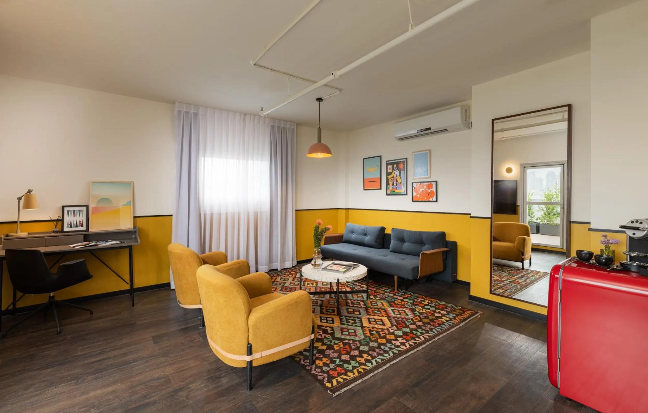 Seating area in PLAY Seaport Suite Hotel TLV