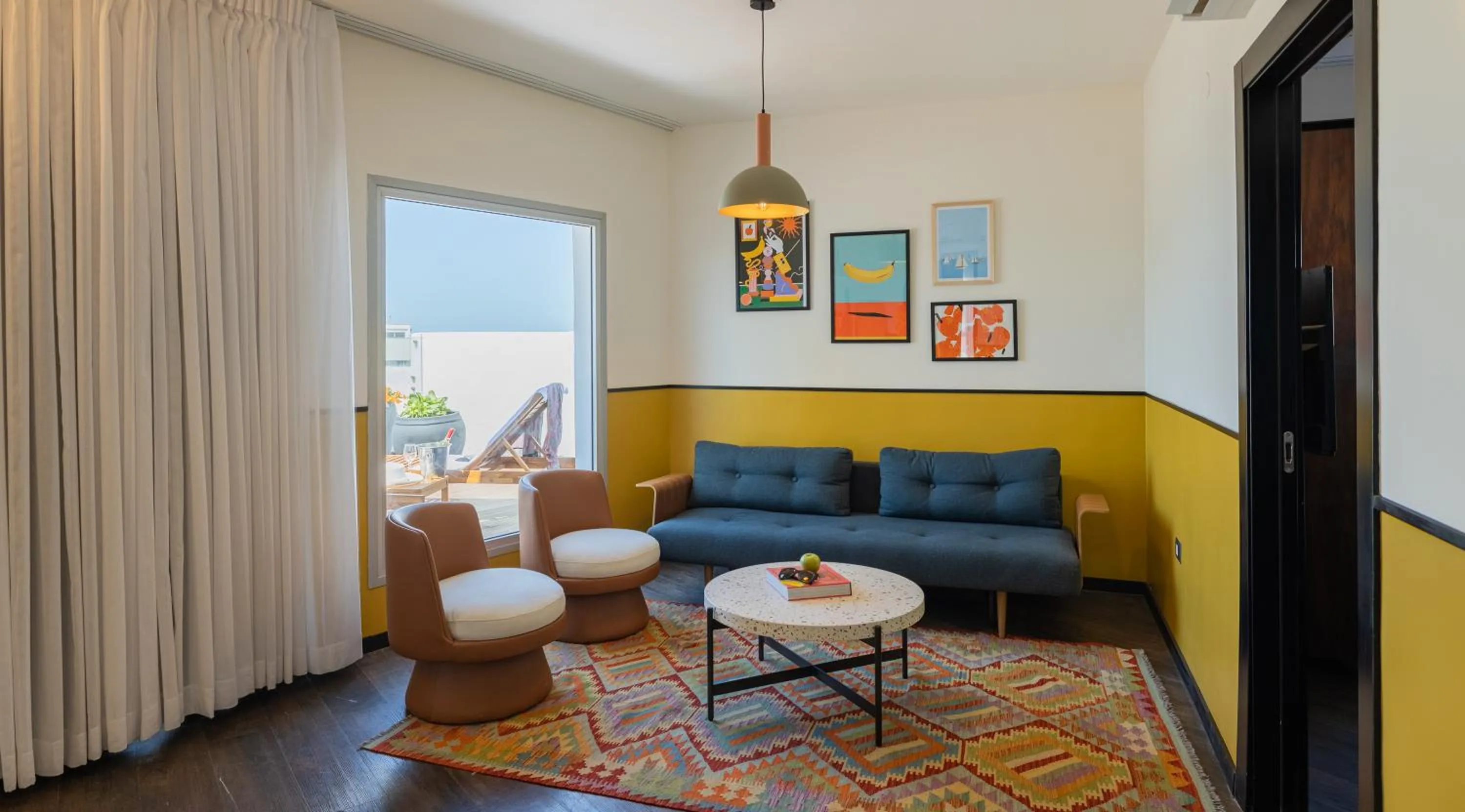 Seating area in PLAY Seaport Suite Hotel TLV