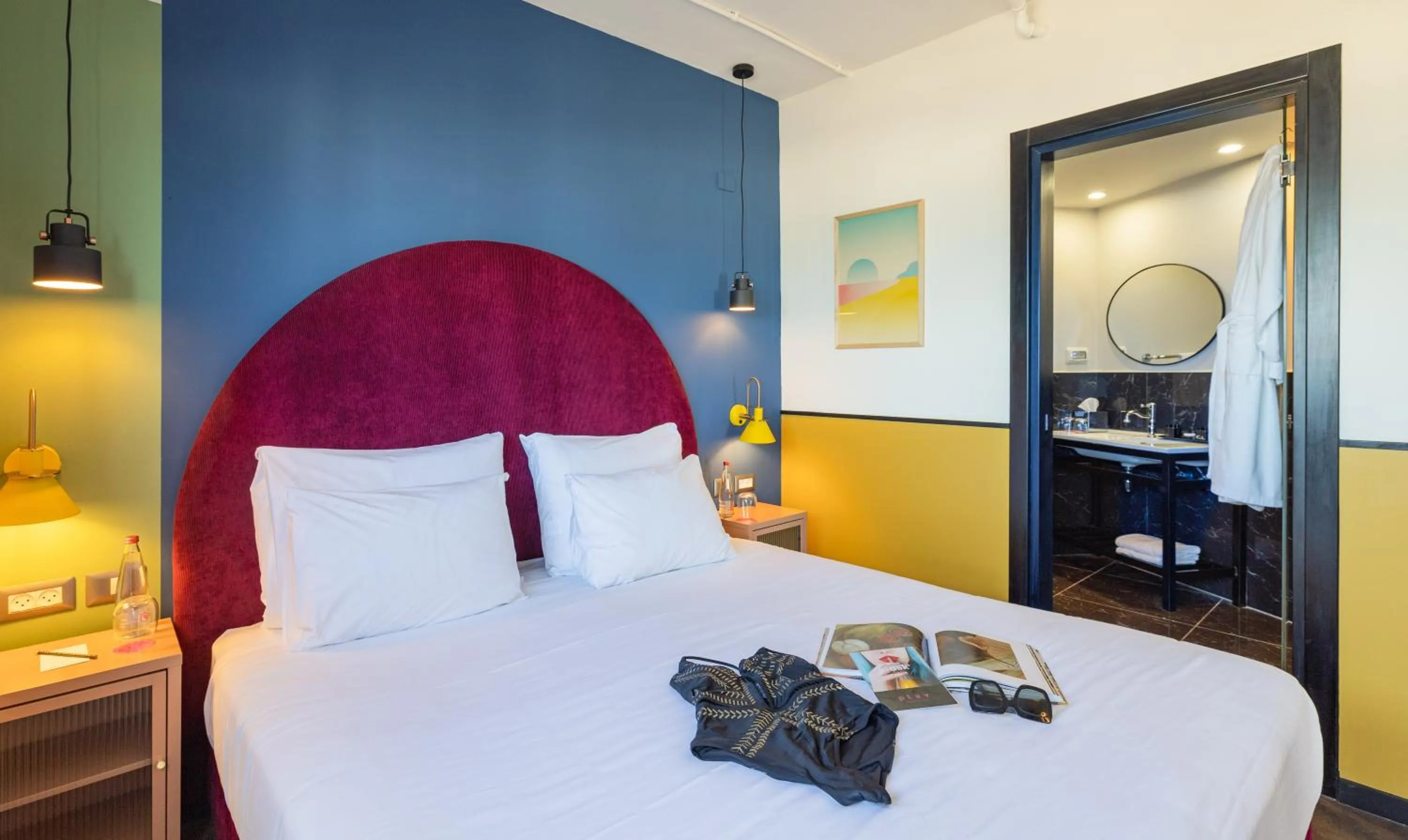 Bed in PLAY Seaport Suite Hotel TLV