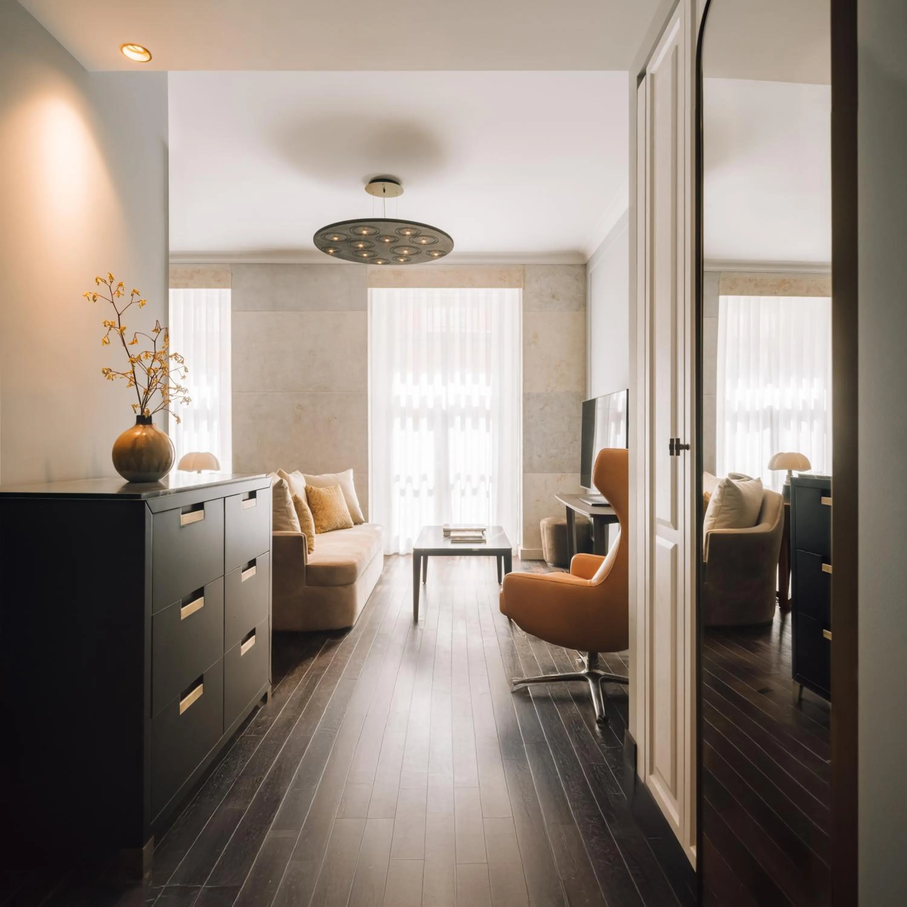 Seating area in MYTHIC SANA Downtown Suites