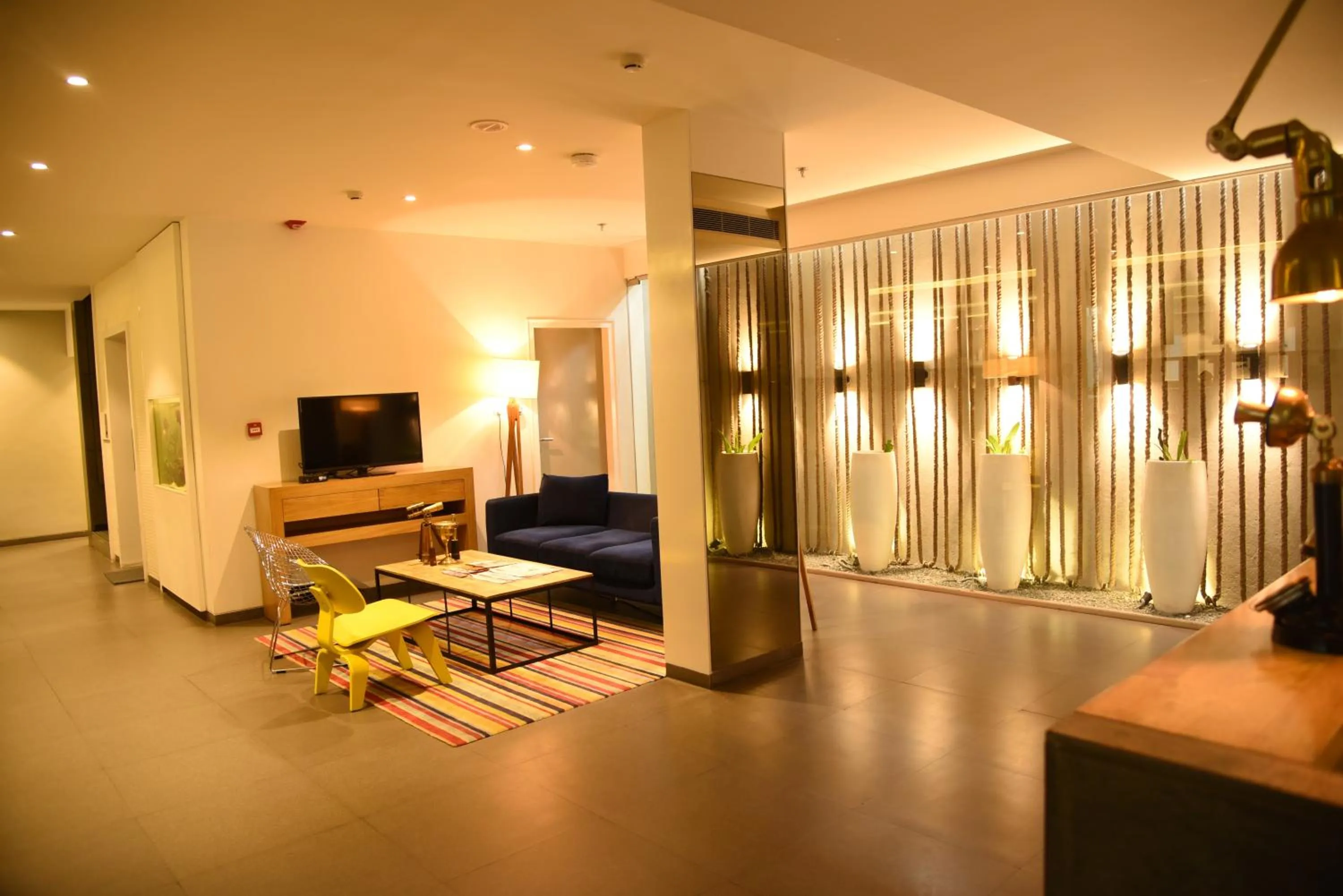 Communal lounge/ TV room in The Port Hotel