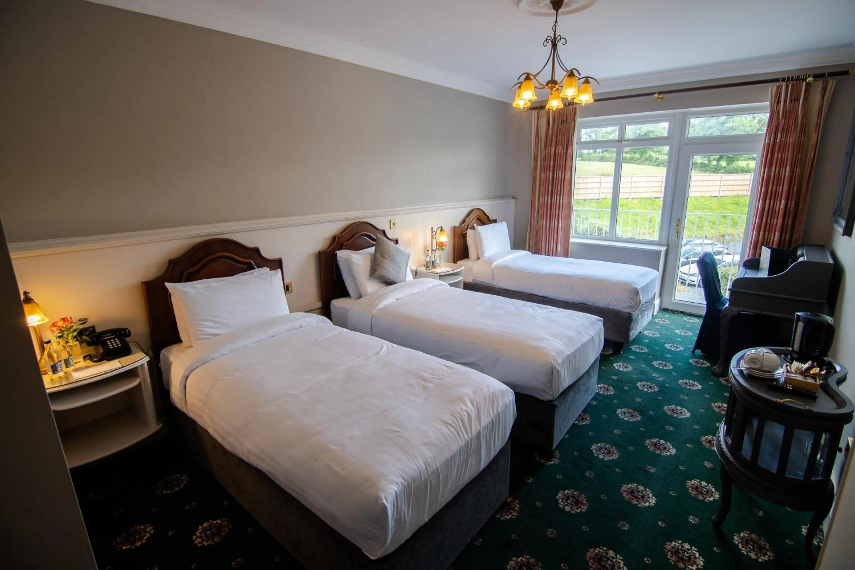 Bed in Lakeside Manor Hotel