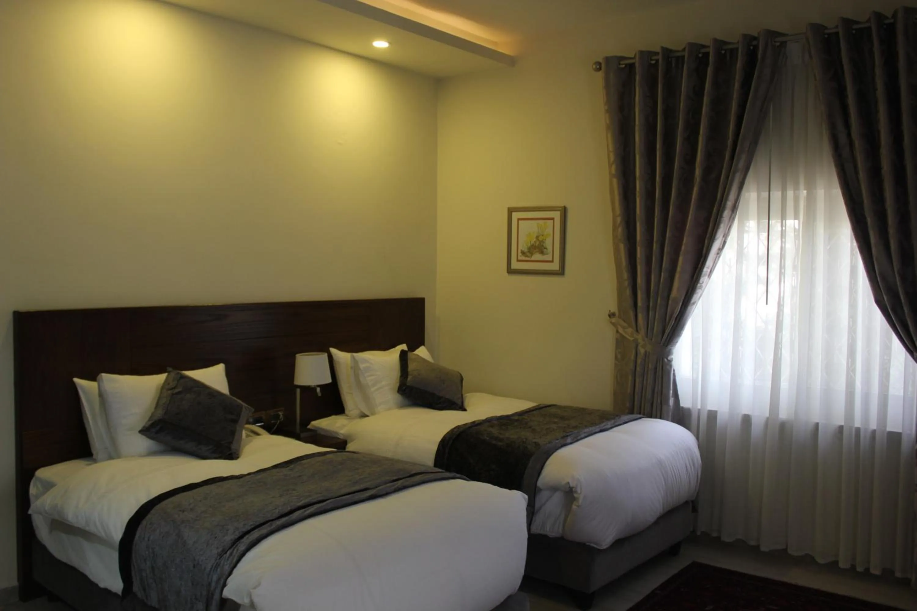 Bed in Lavender Boutique Hotel