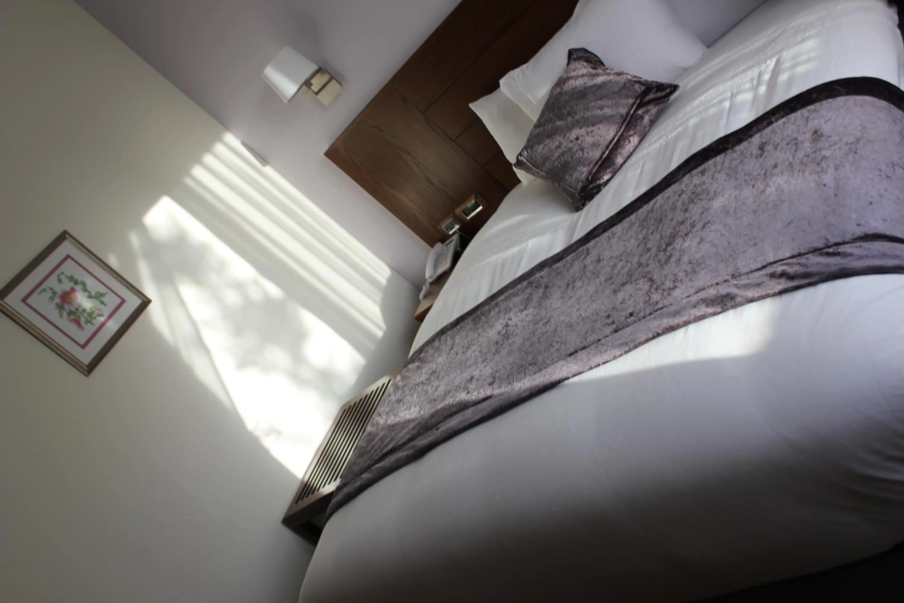 Bed in Lavender Boutique Hotel